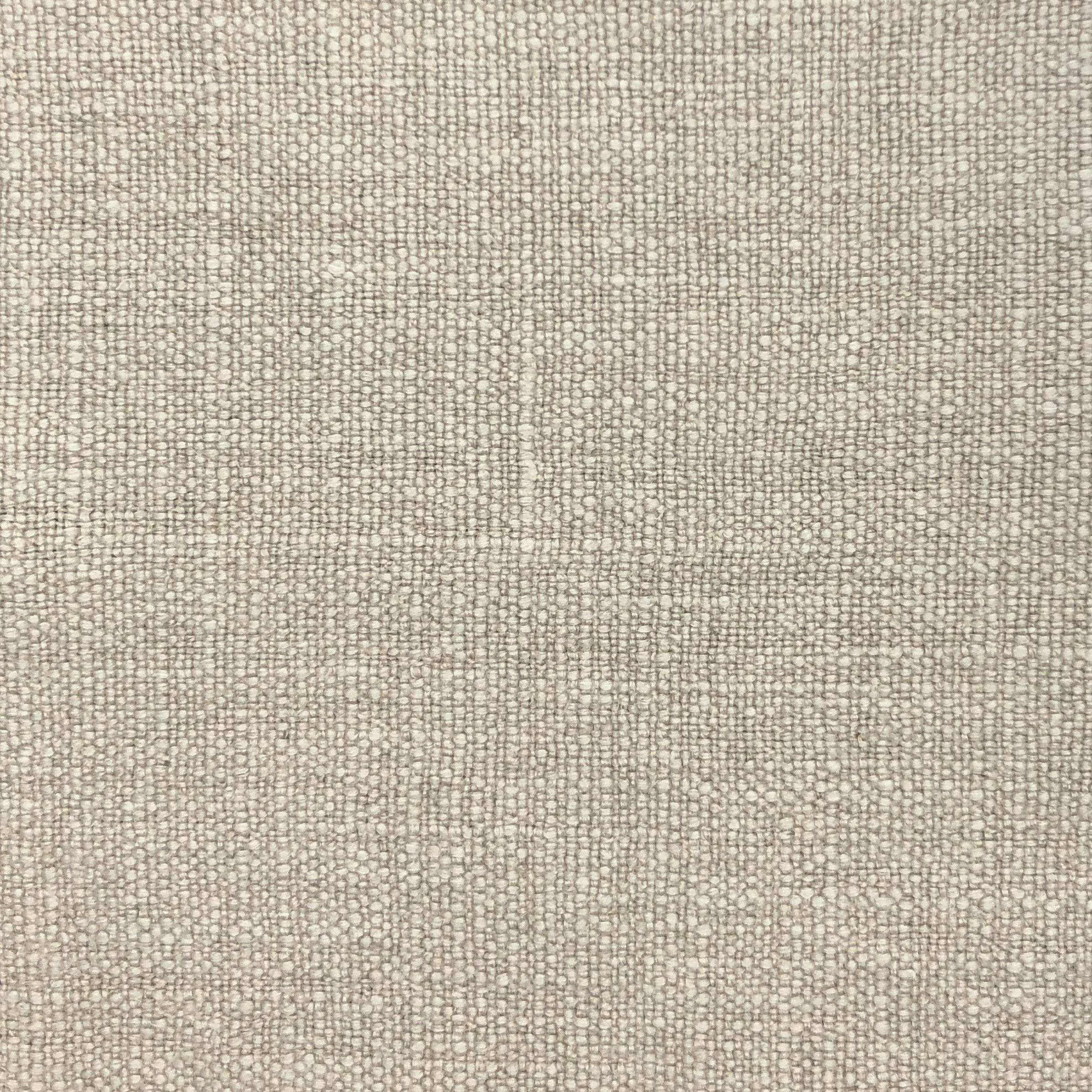 Close up of textured beige fabric 