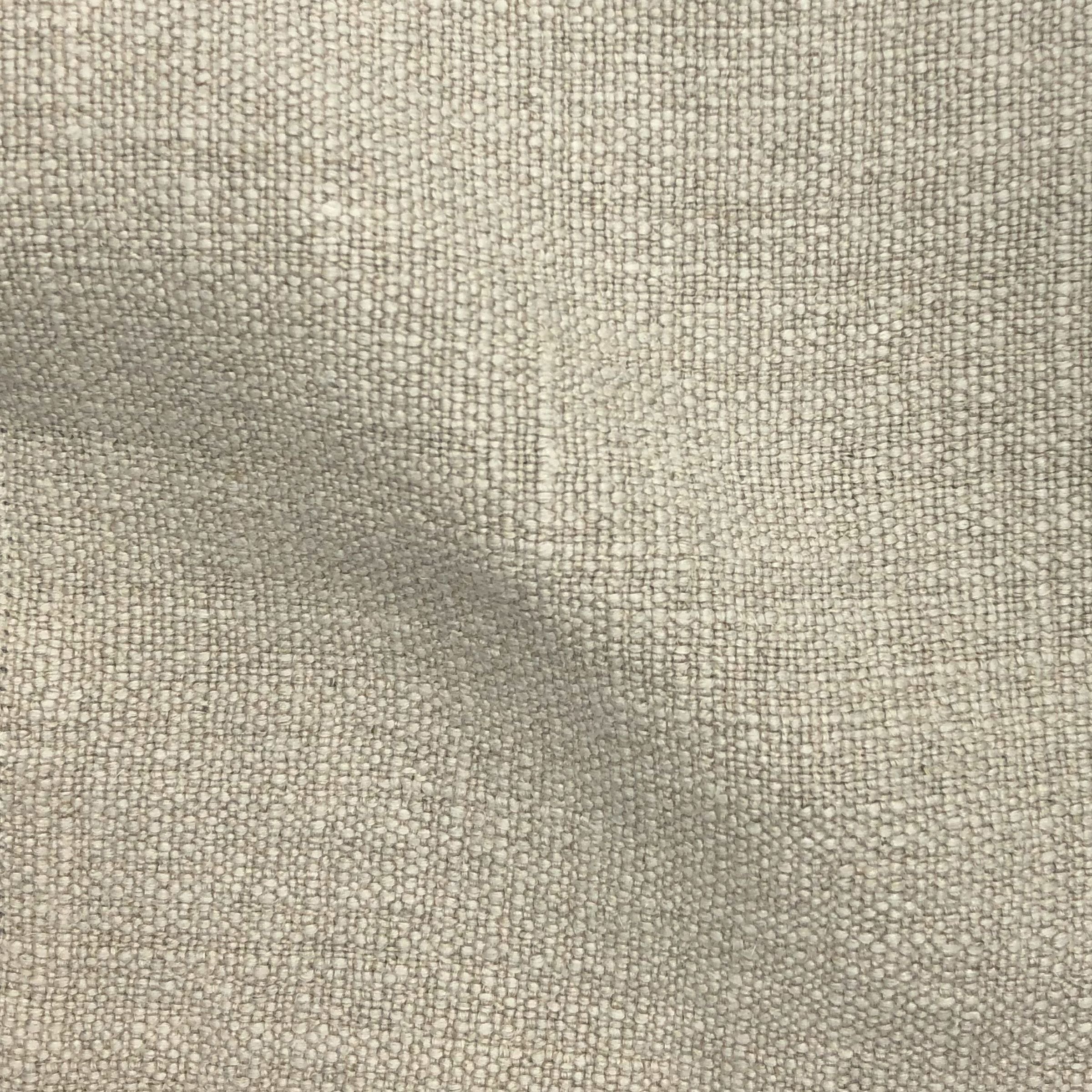 Textured beige fabric with slight wavy folds