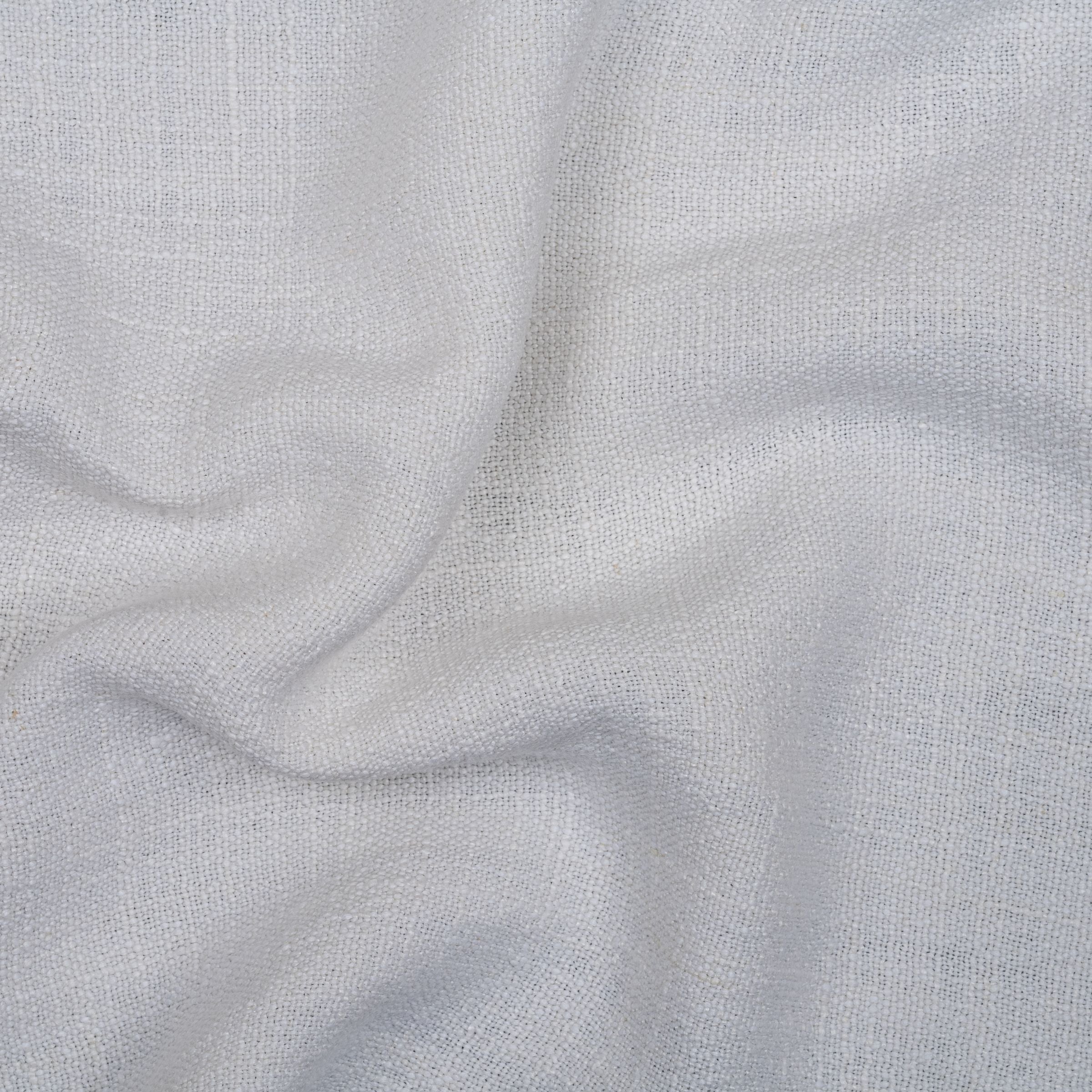 White textured fabric with slight folds