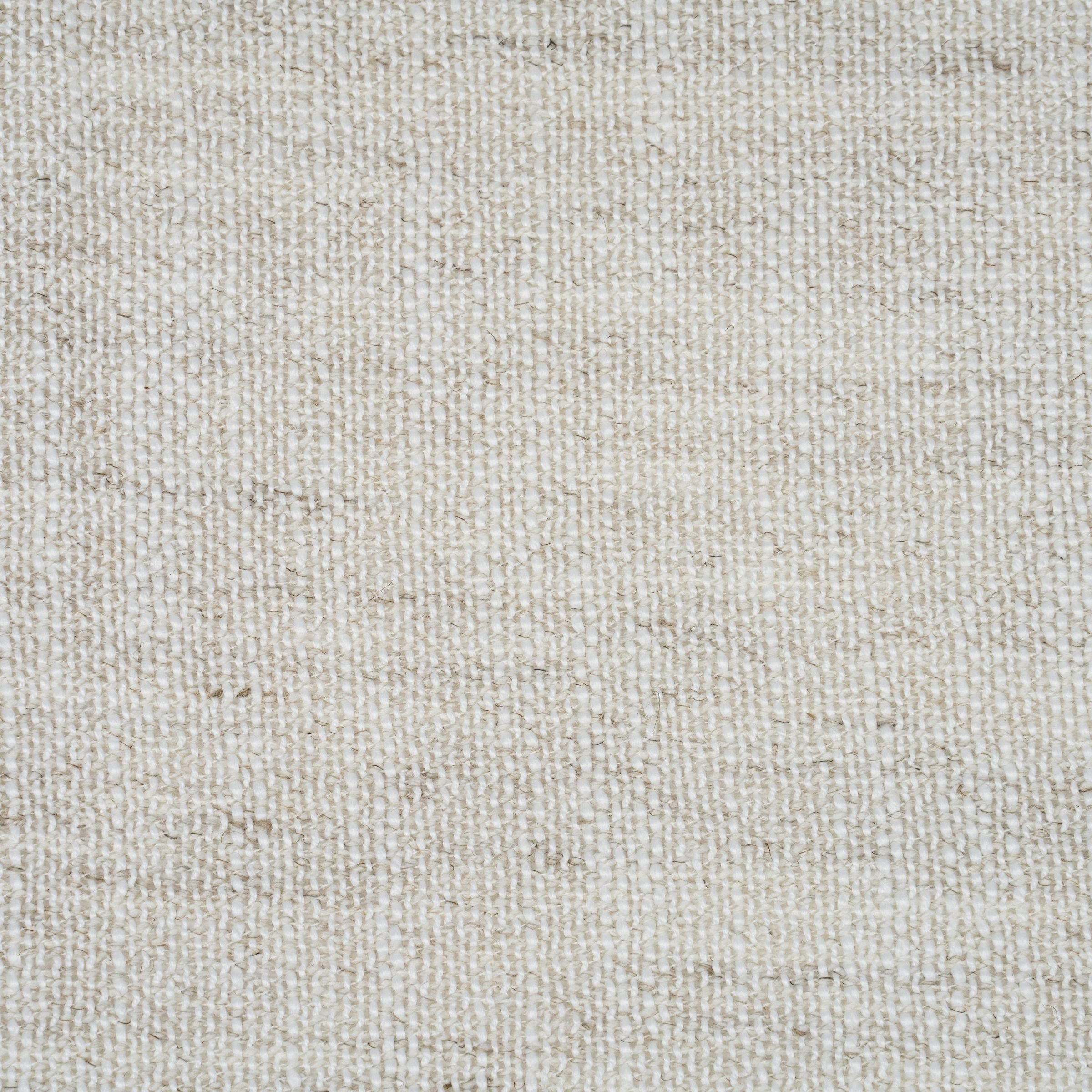 Close-up of a textured beige fabric surface