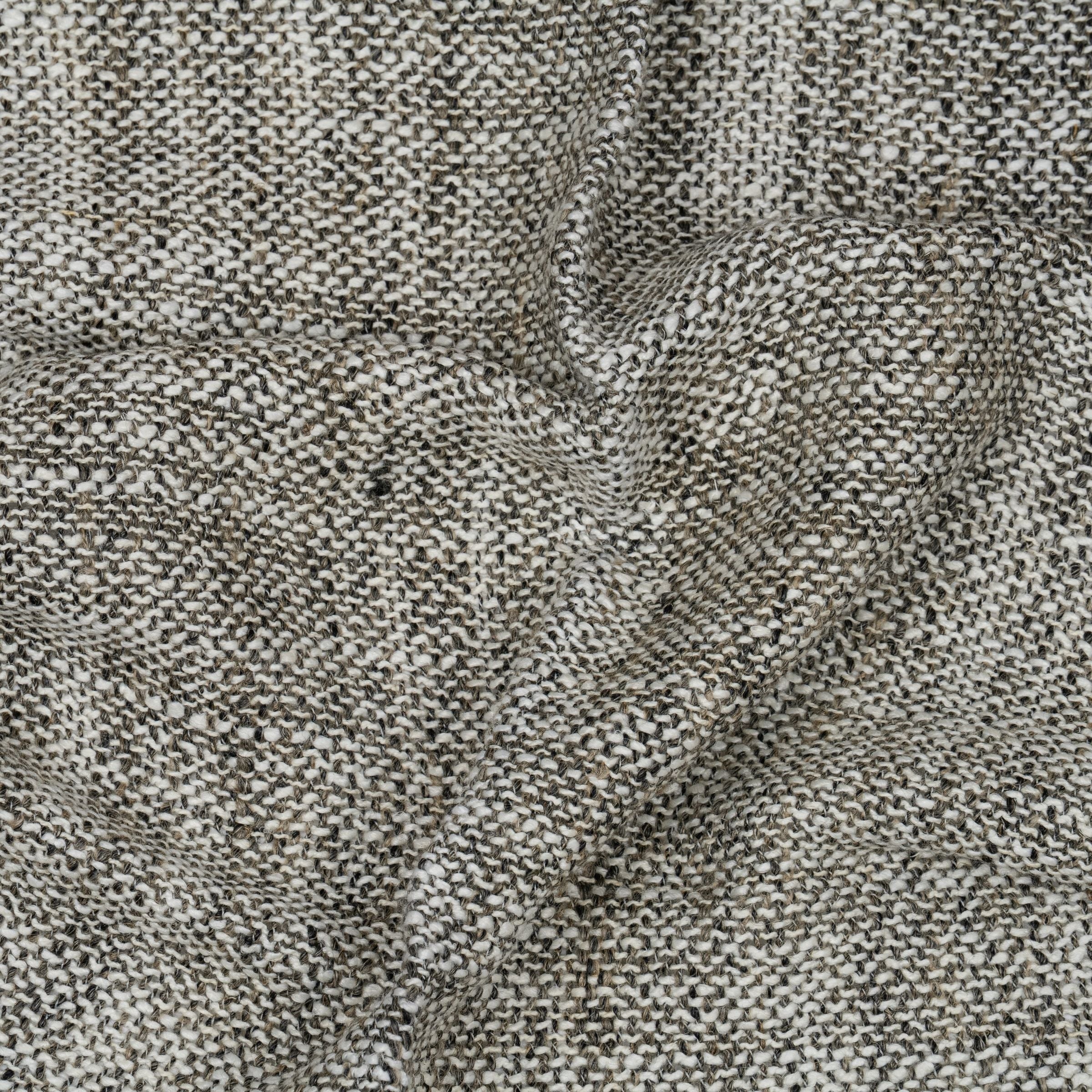 Textured fabric pattern with neutral white and beige tones and subtle folds