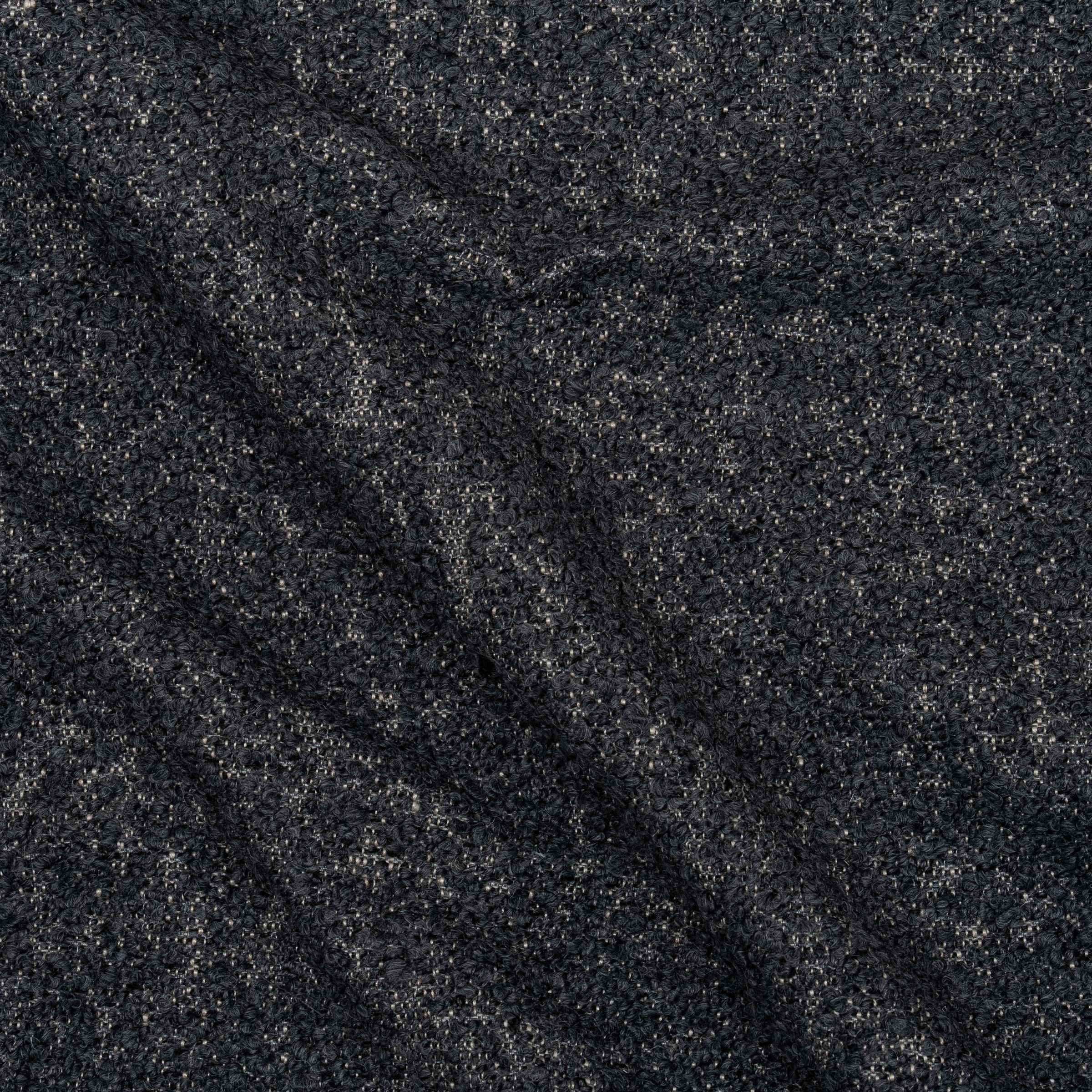 Fuzzy charcoal gray boucle fabric with wavy folds