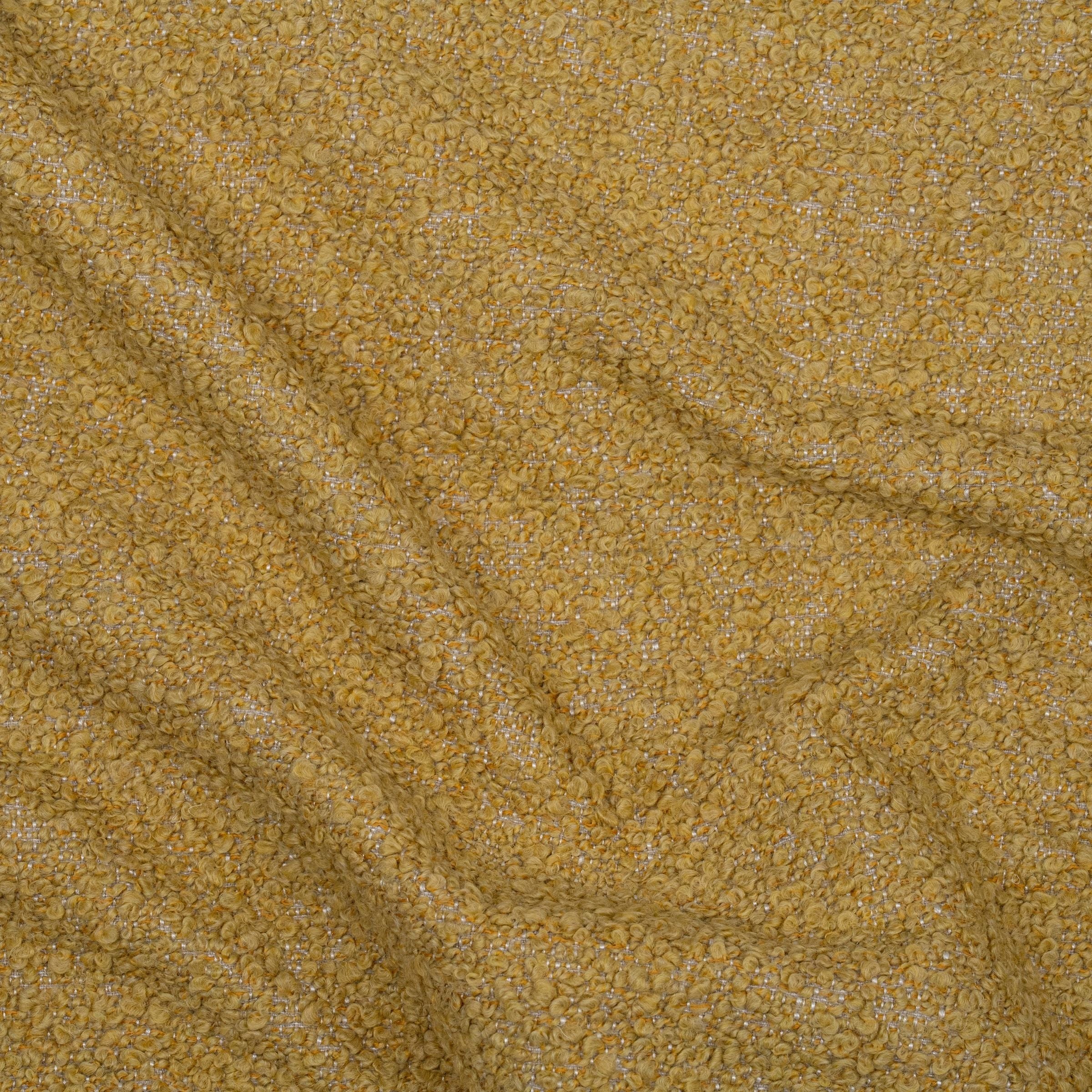 Bright yellow fuzzy boucle upholstery fabric with wavy folds