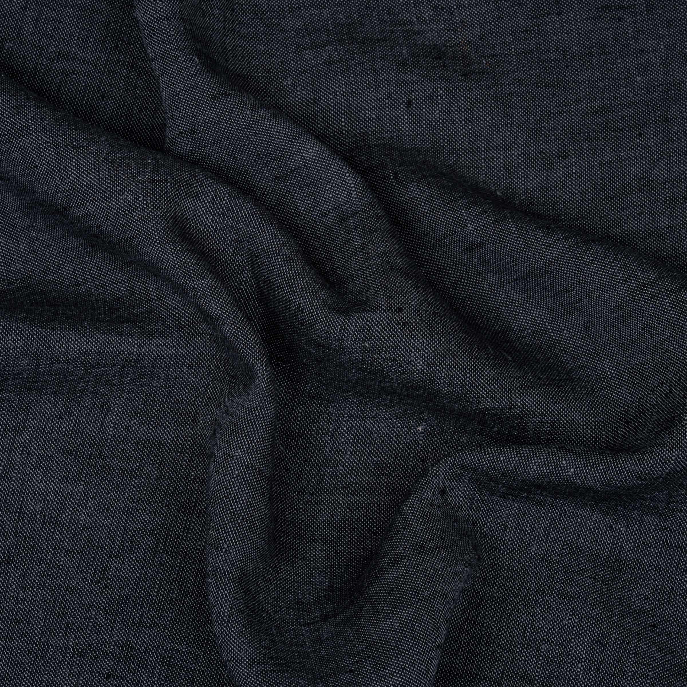 Close-up of dark charcoal fabric with visible folds