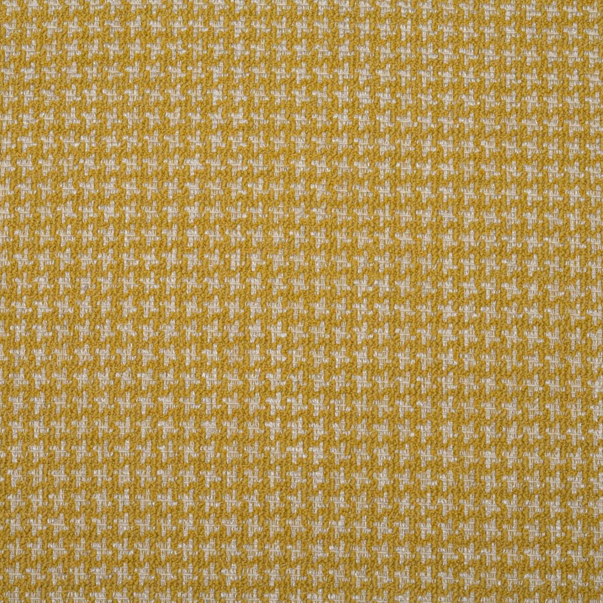 Textured upholstery with a subtle crosshatch design on a yellow background