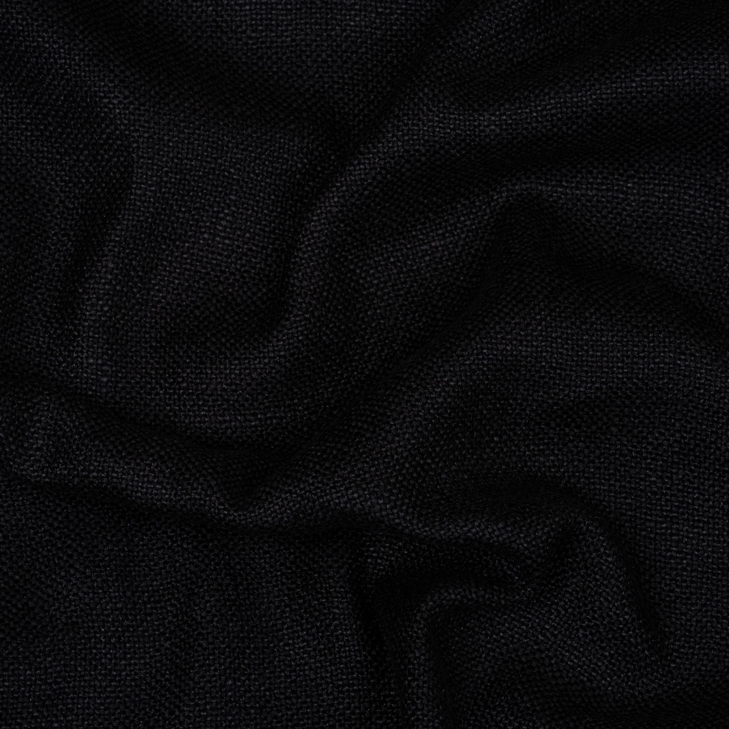 Solid black fabric with wavy folds