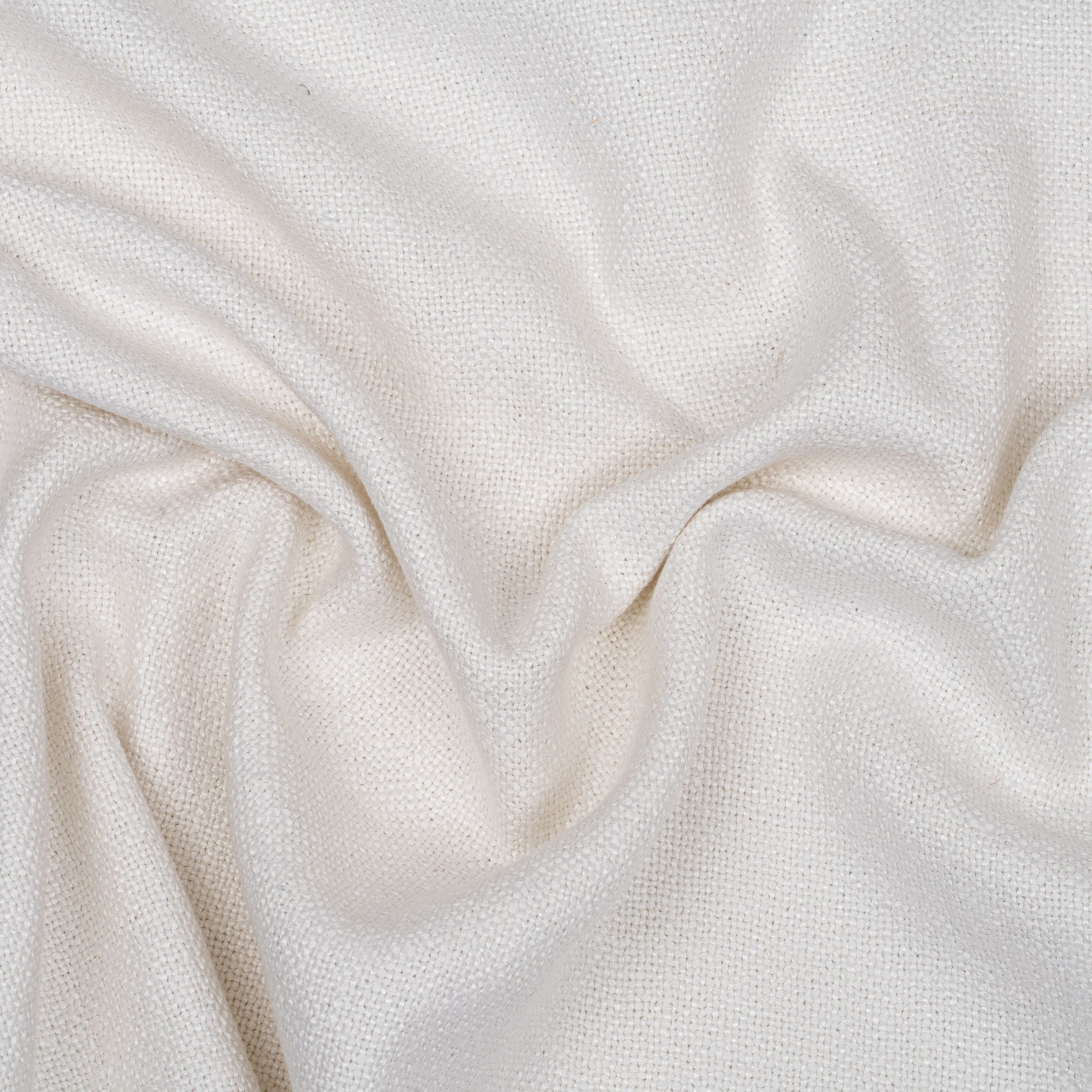 Solid white fabric with wavy folds
