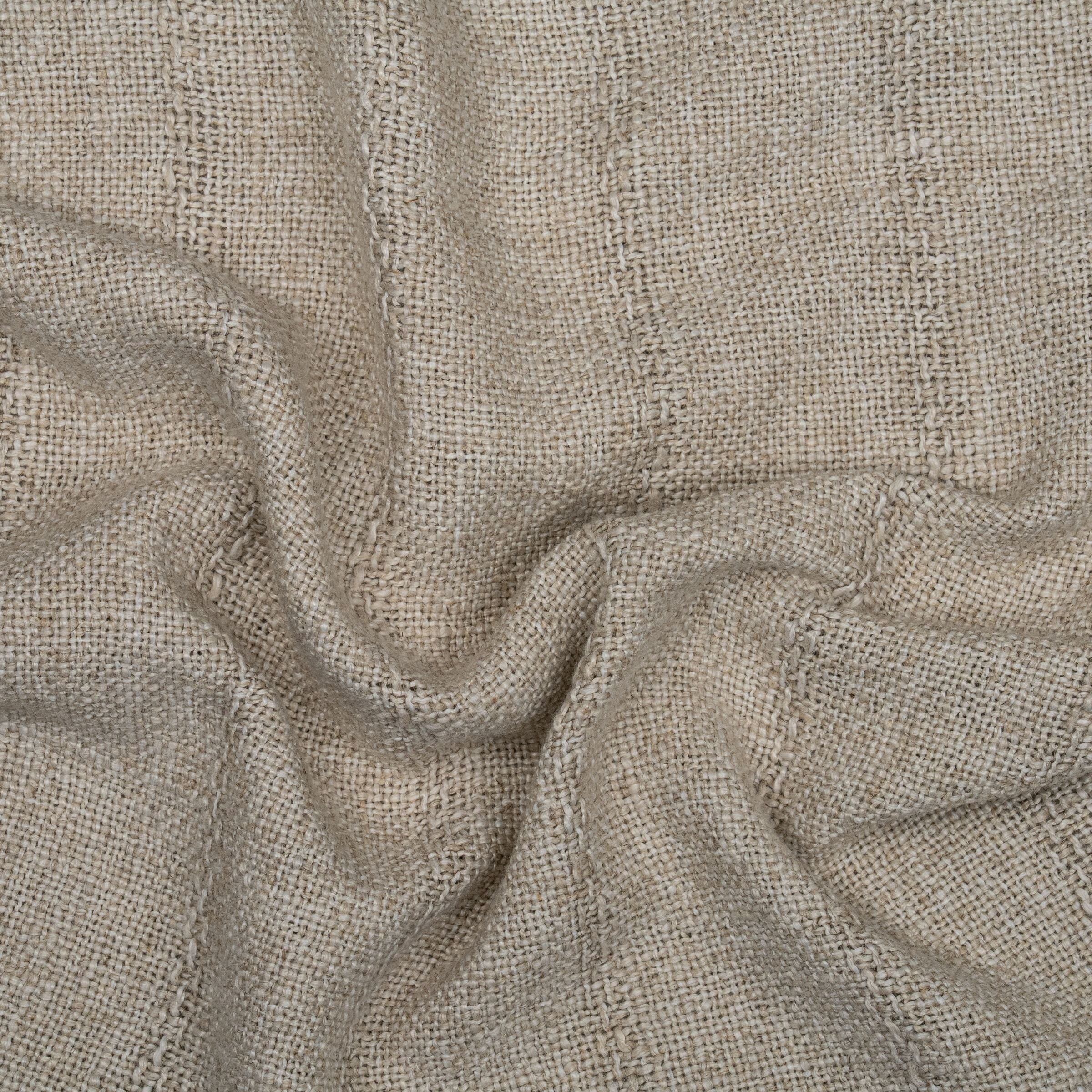 Vintage beige fabrics with subtle stripe pattern and wavy folds