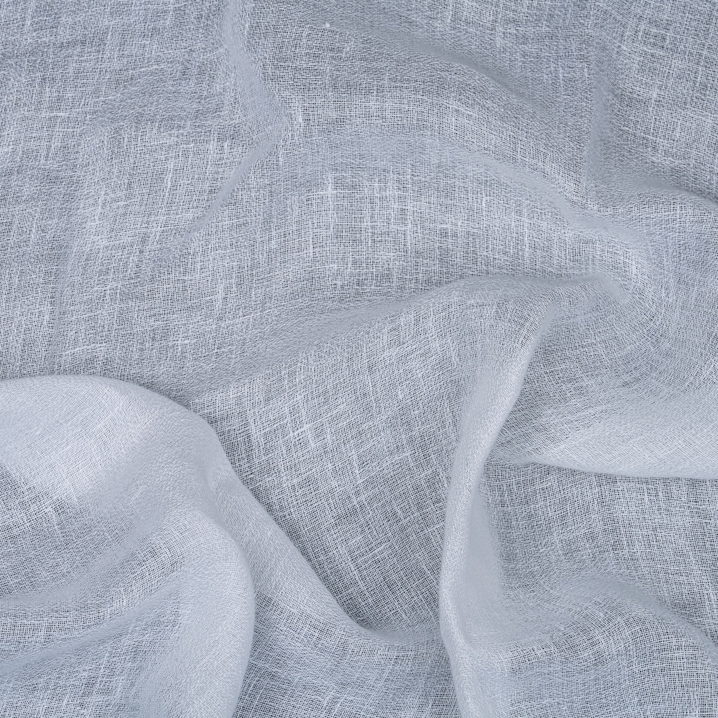 White sheer fabric with a sheen and subtle folds