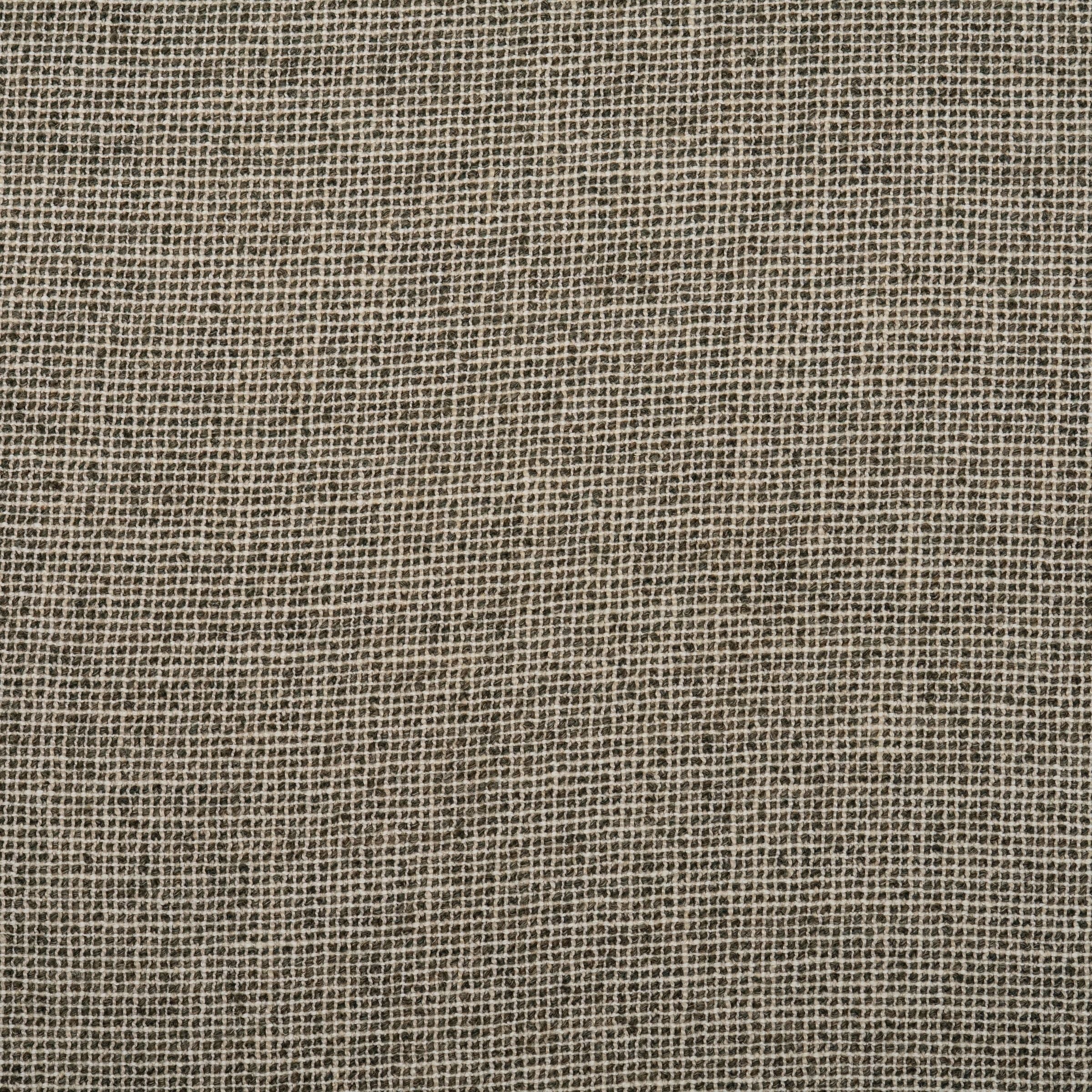 Zoomed out view of a fabric pattern with a grid-like structure in shades of green