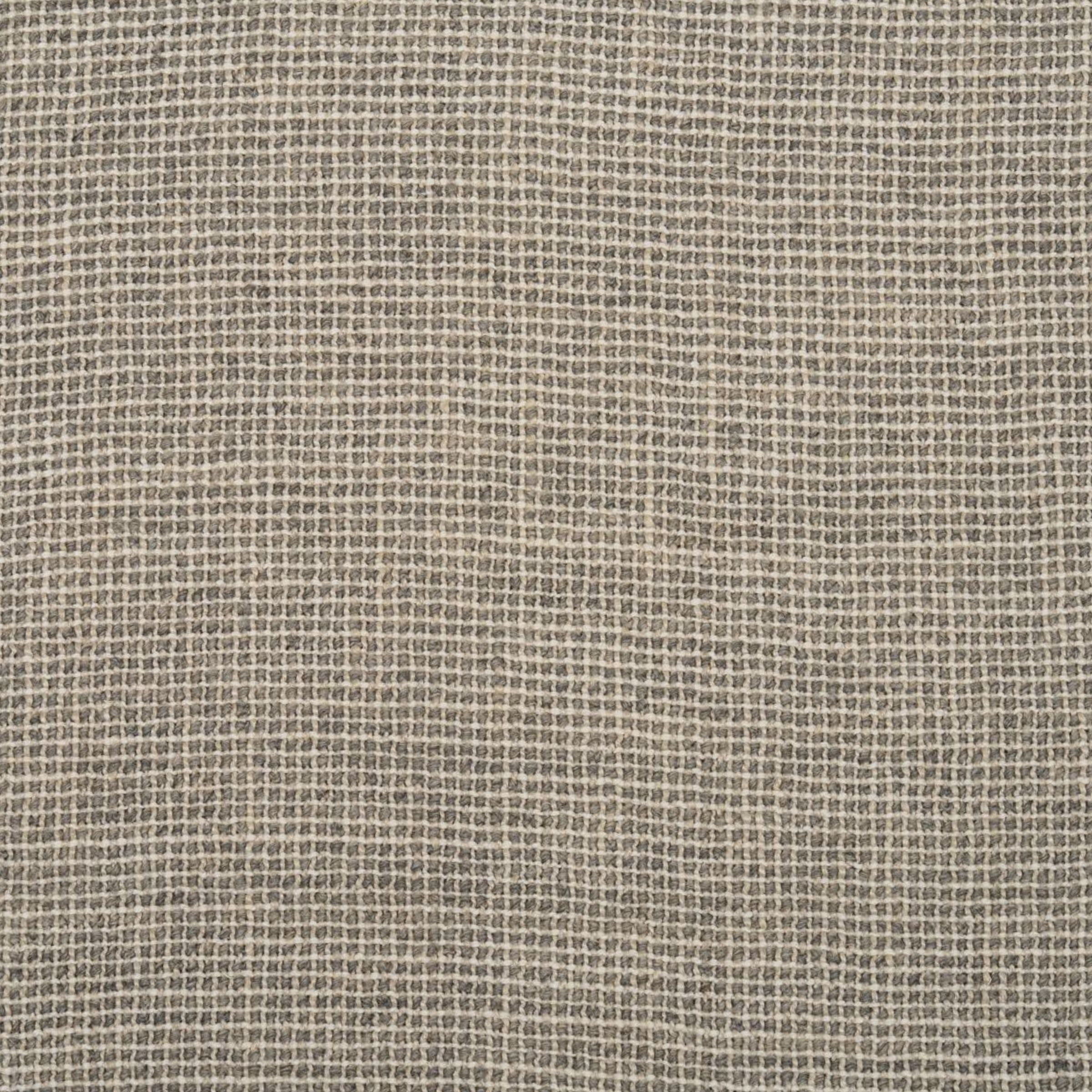 Zoomed out view of a fabric pattern with a grid-like structure in shades of gray