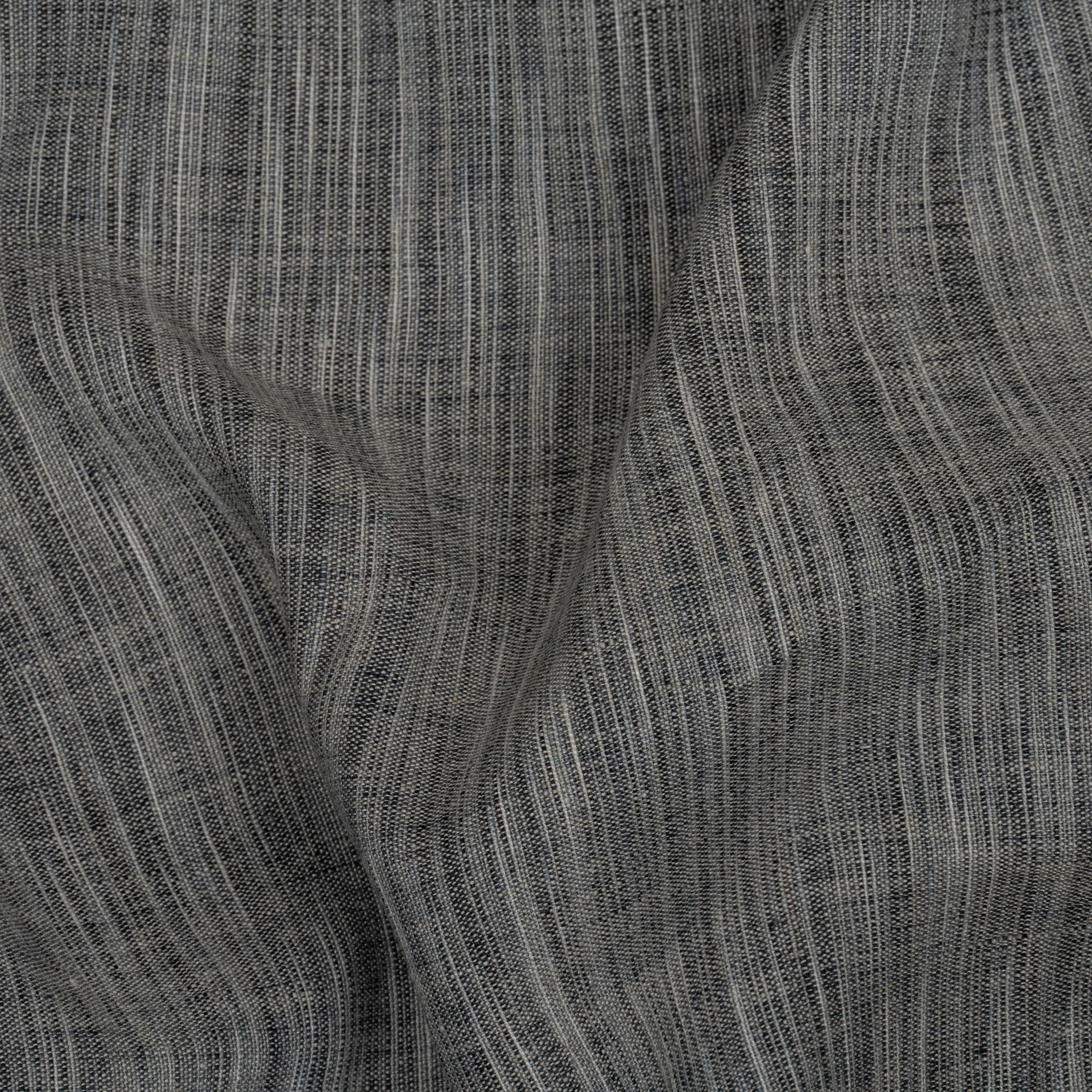 Gray fabric showing the interwoven light and dark gray threads and subtle folds