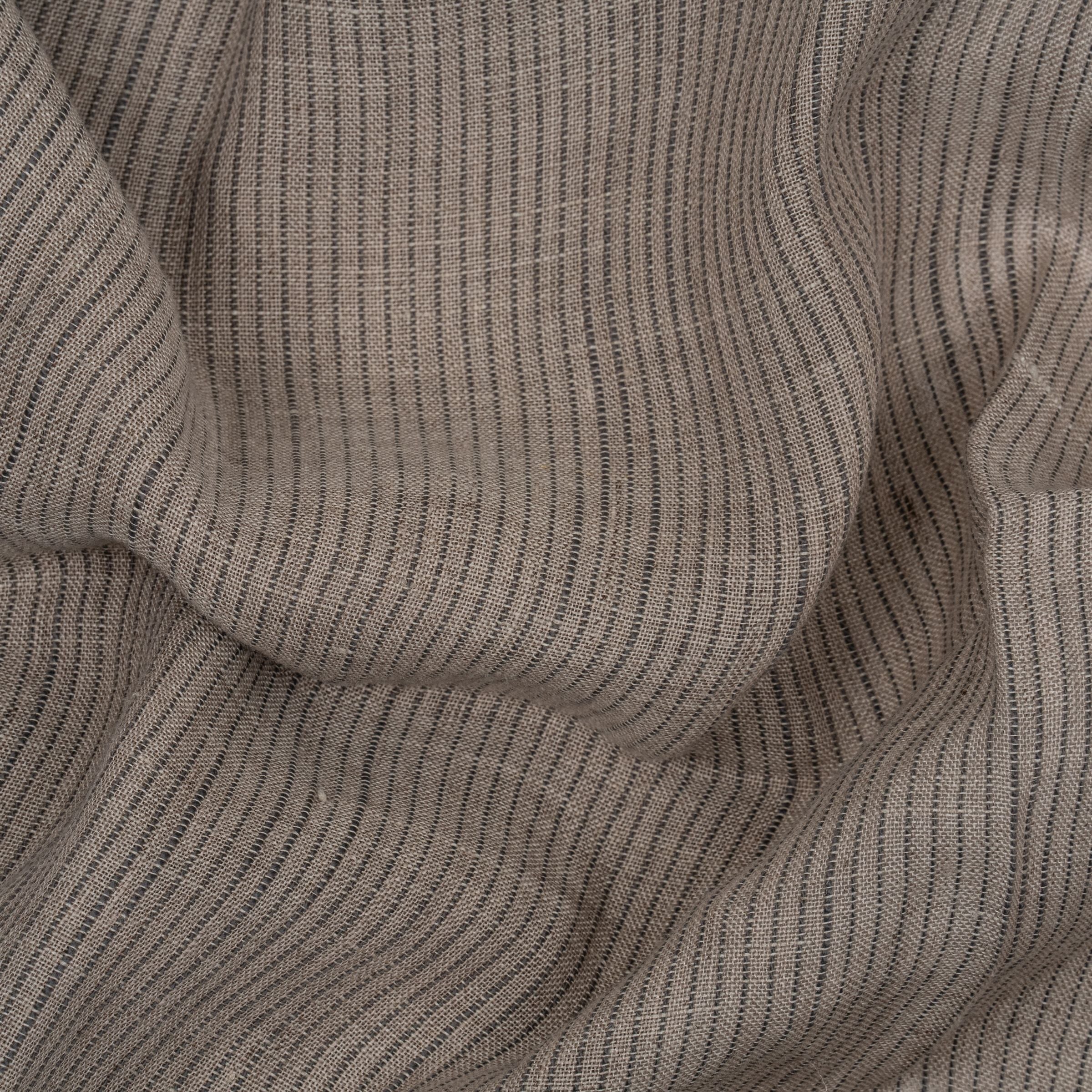 Close-up of ribbed fabric with wavy folds