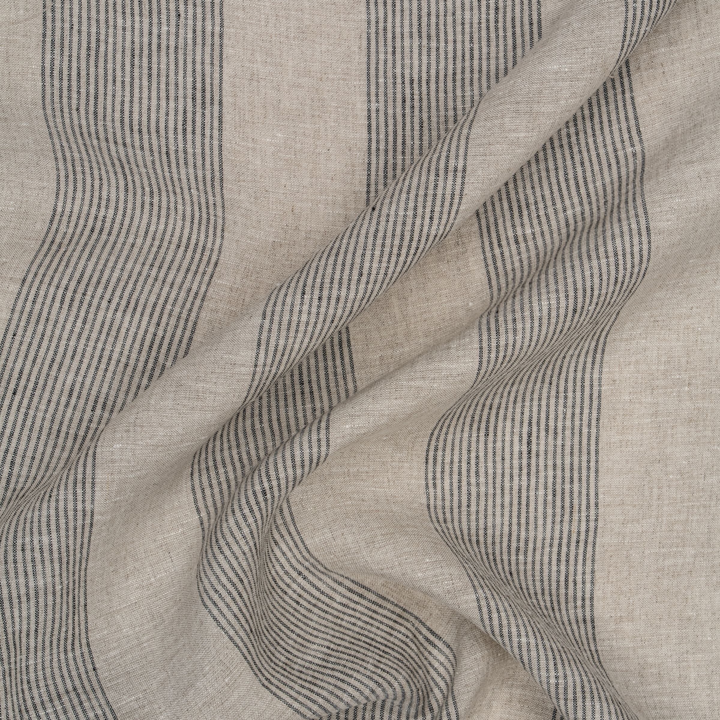 Linen color fabric with charcoal pinstripes and wavy folds