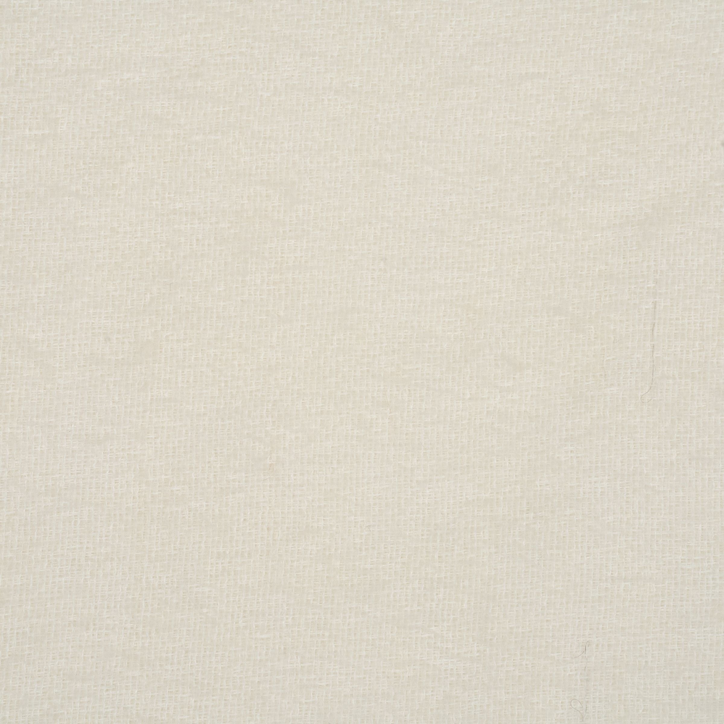White cream-colored fabric soft to the touch and fuzzy texture