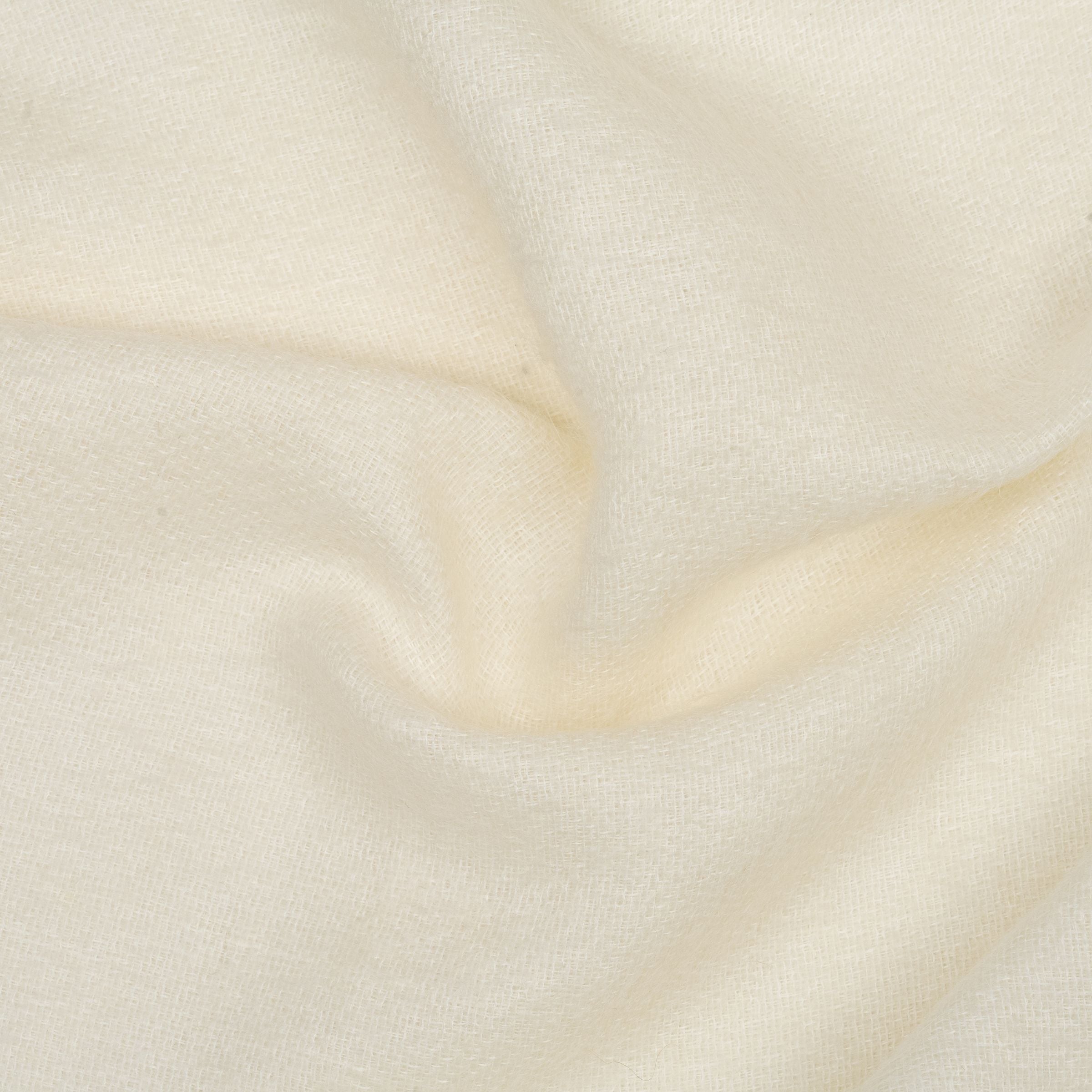 Fuzzy white fabric with subtle folds