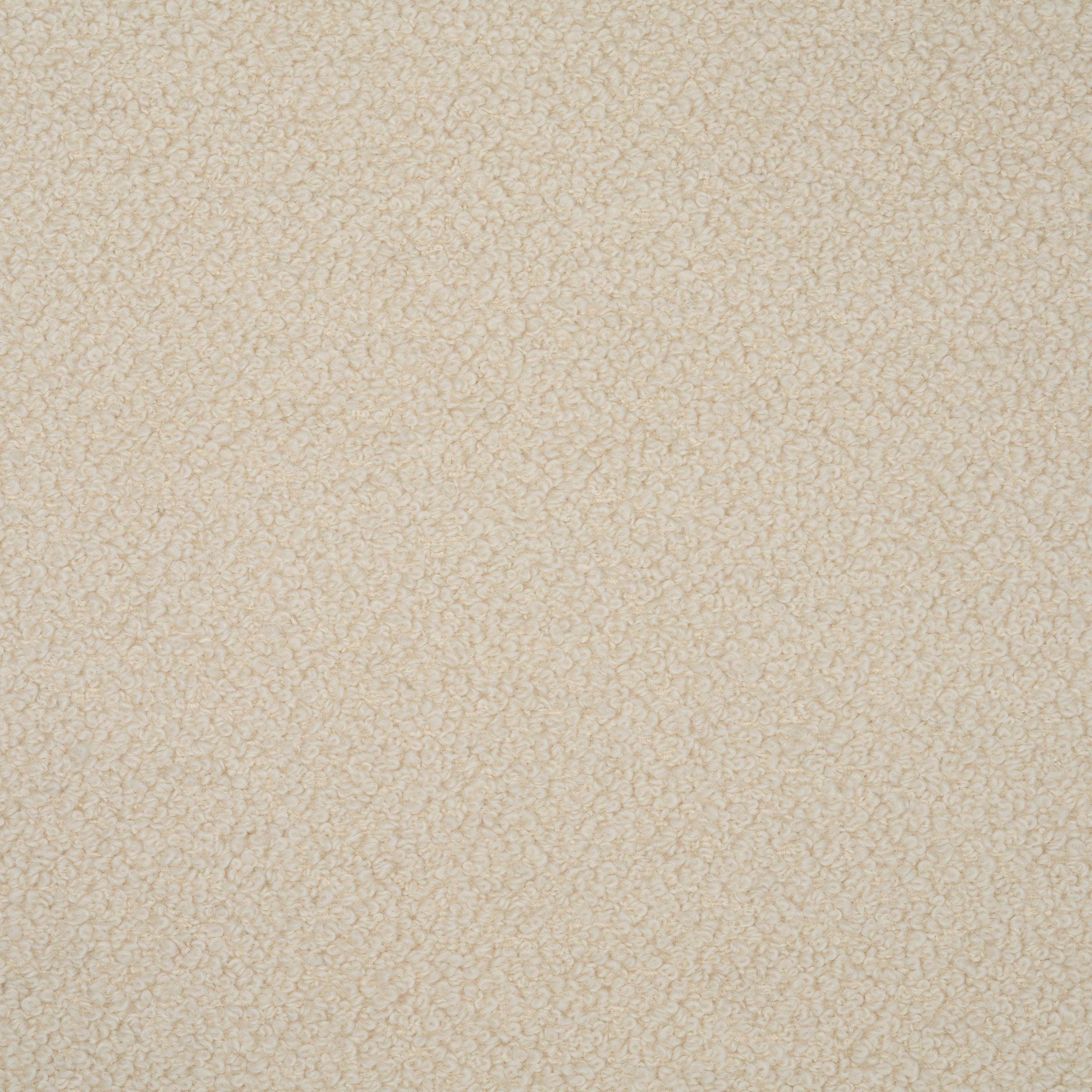 Zoomed out view of cream colored boucle upholstery
