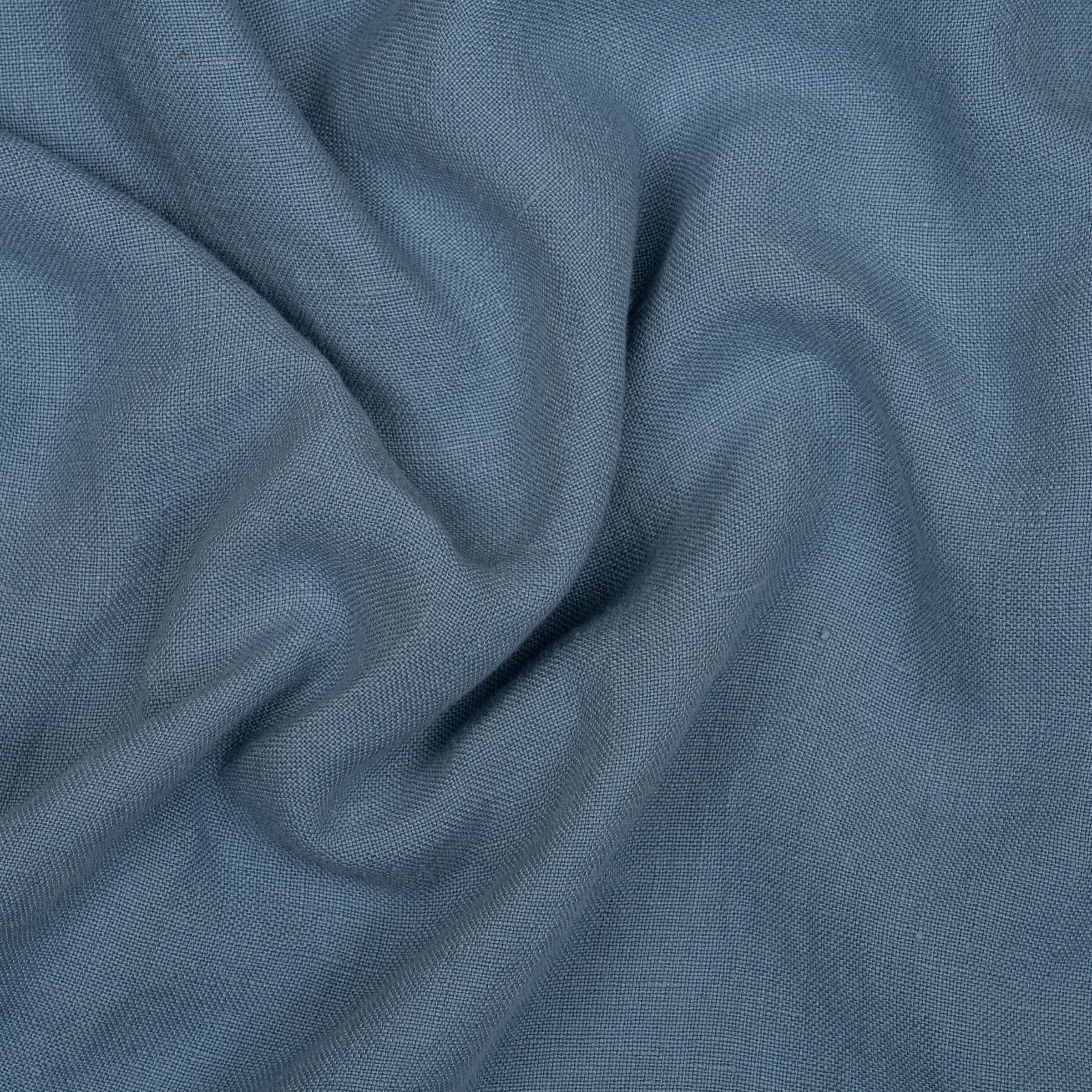 Sky blue fabric with wavy folds