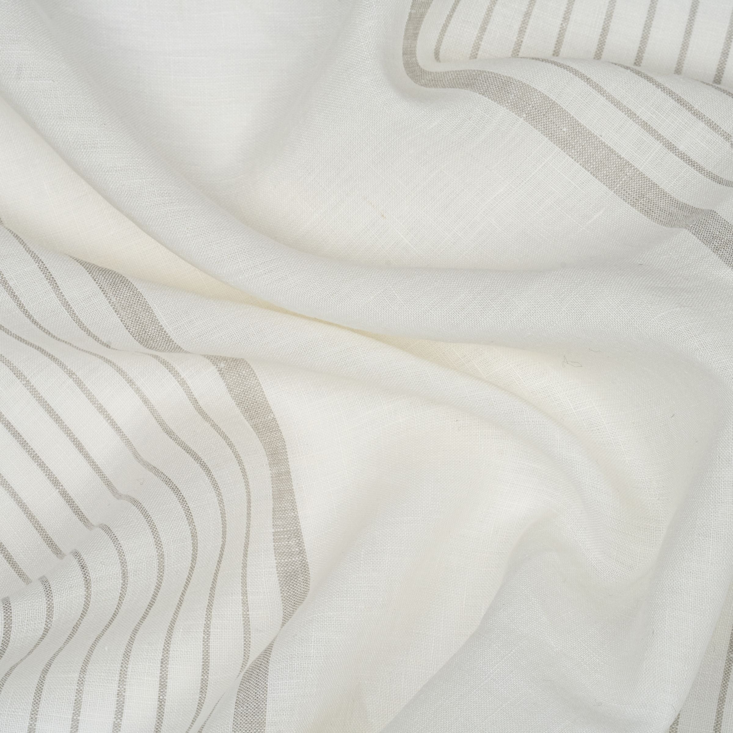White fabric with gray stripes and wavy folds