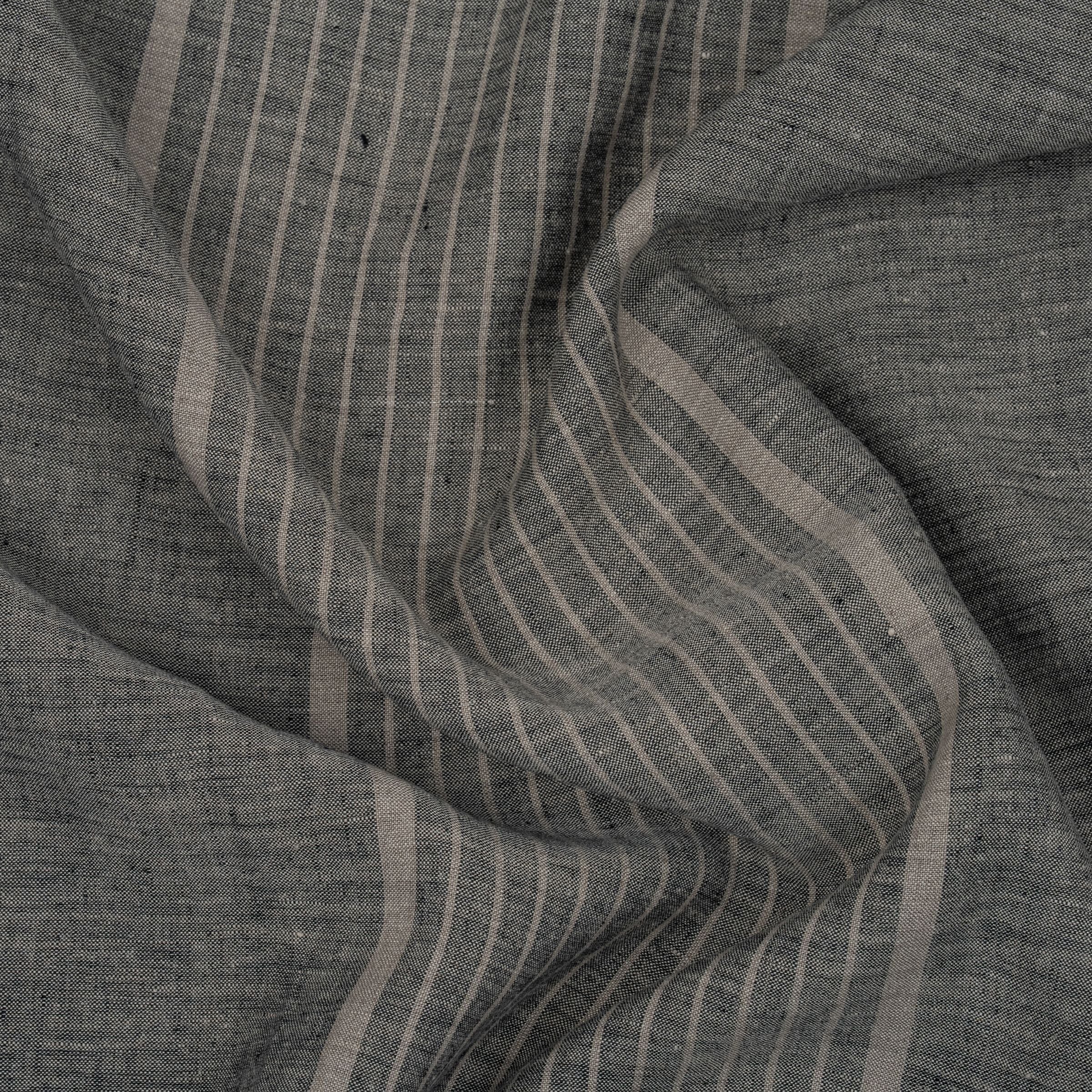 Gray fabric with subtle gray striped pattern and wavy folds