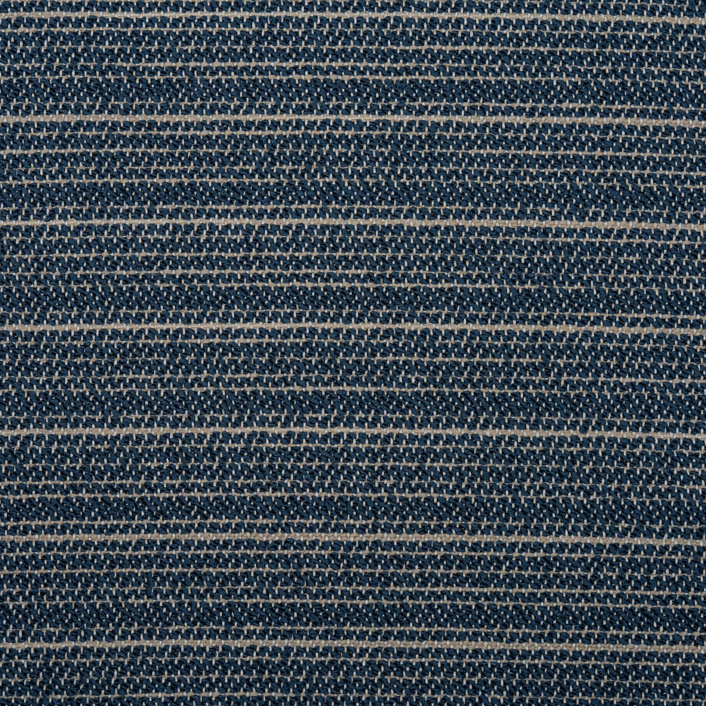 Zoomed out view of textured blue and beige upholstery pattern
