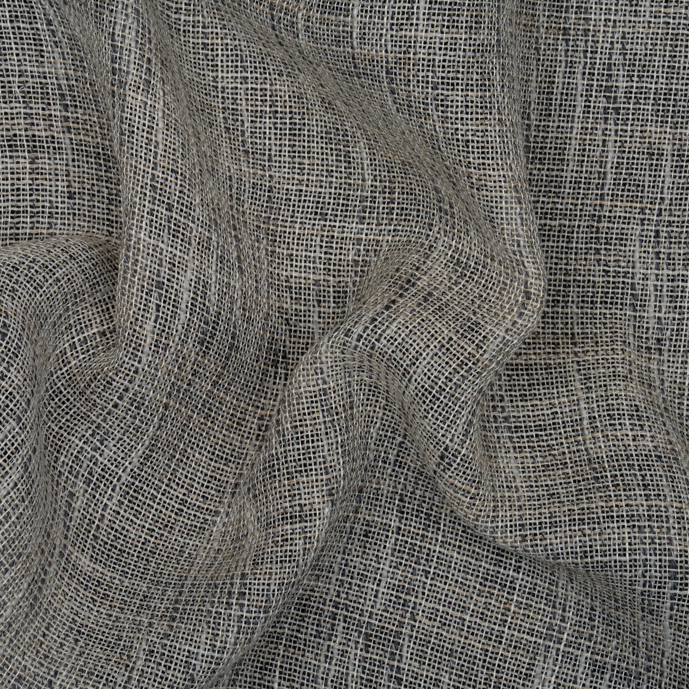 Close-up of textured gray fabric with subtle folds
