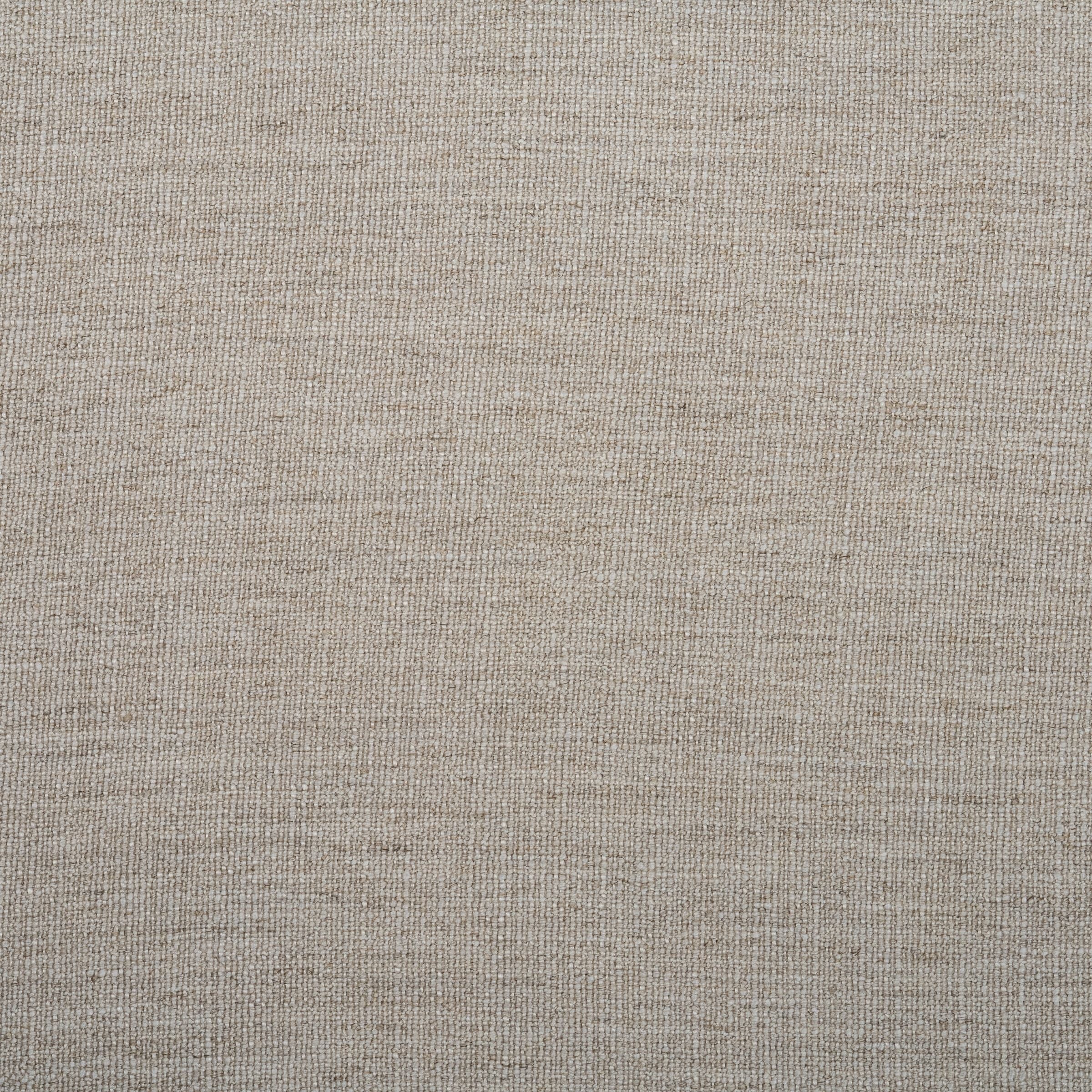 Zoomed out view textured beige upholstery