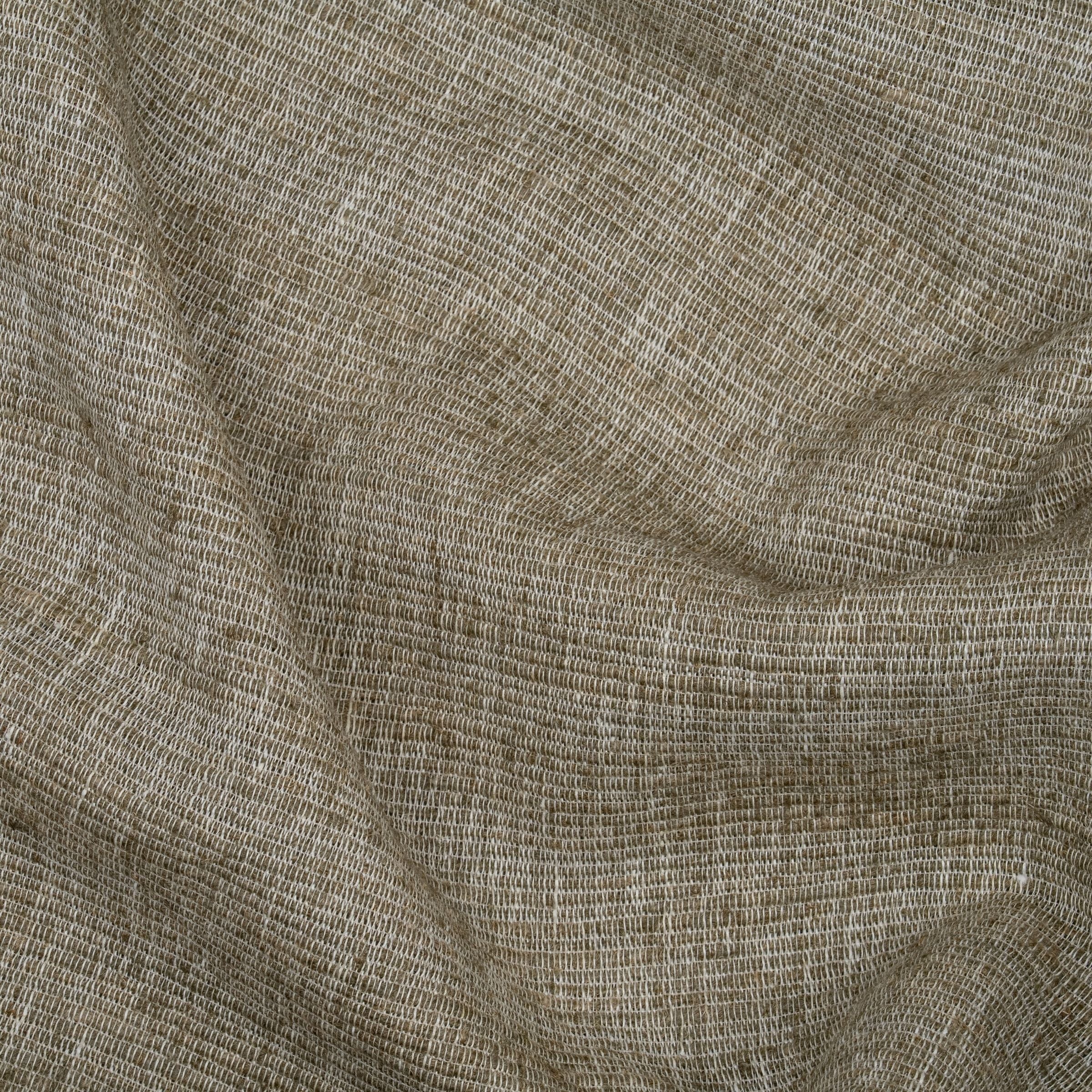 Green textured fabric with subtle wavy folds