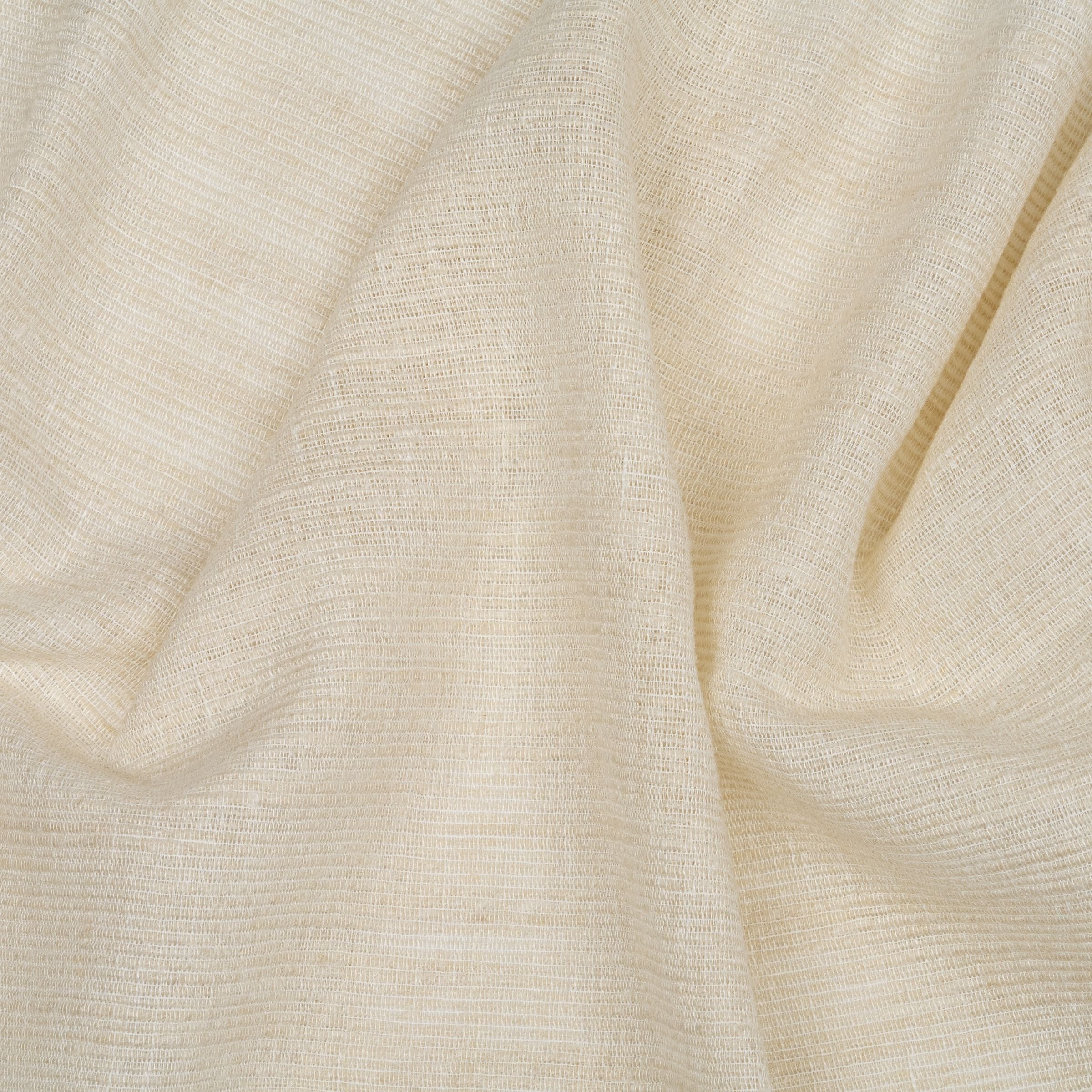 White fabric with a soft texture and subtle folds