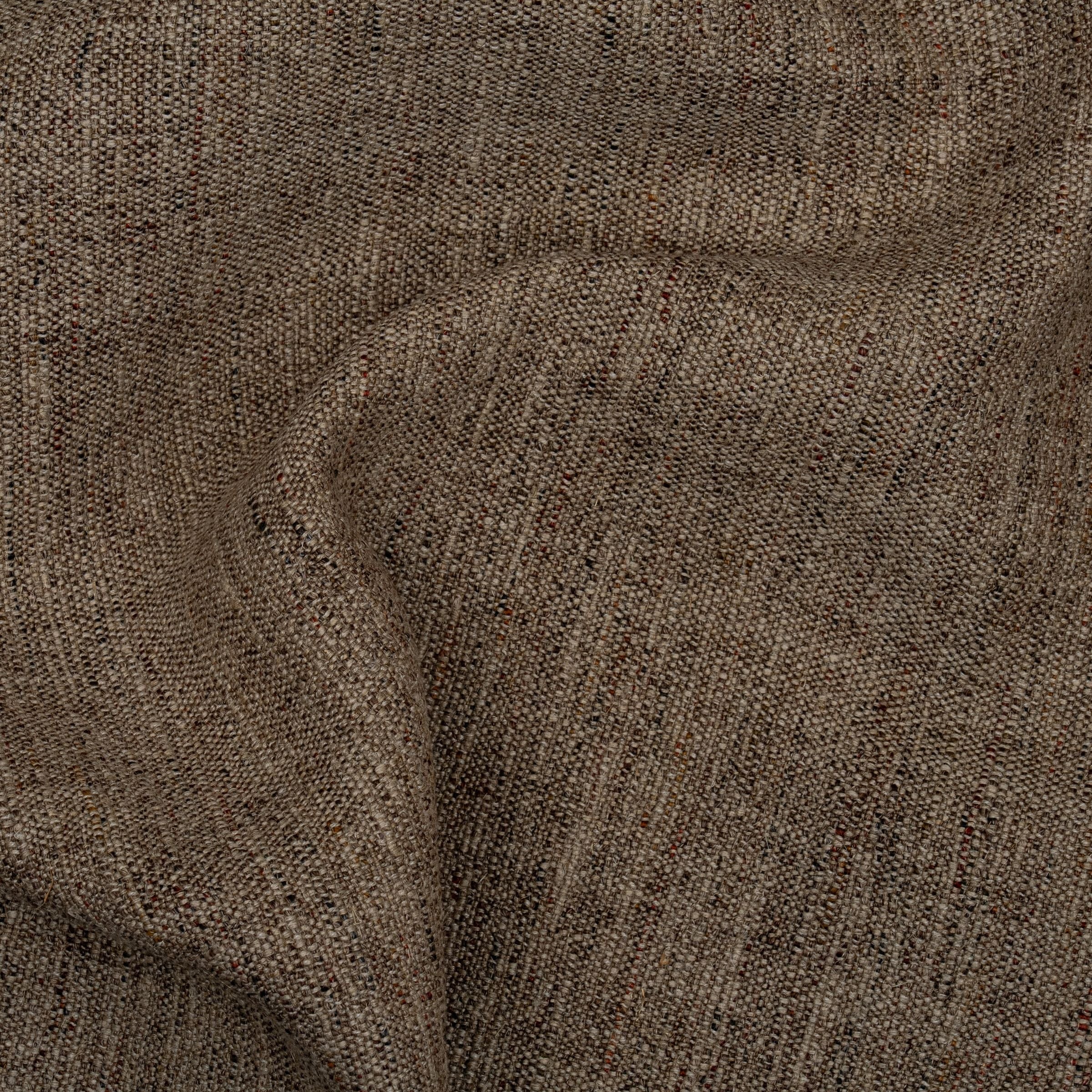 Brown and red accent textured upholstery with subtle folds