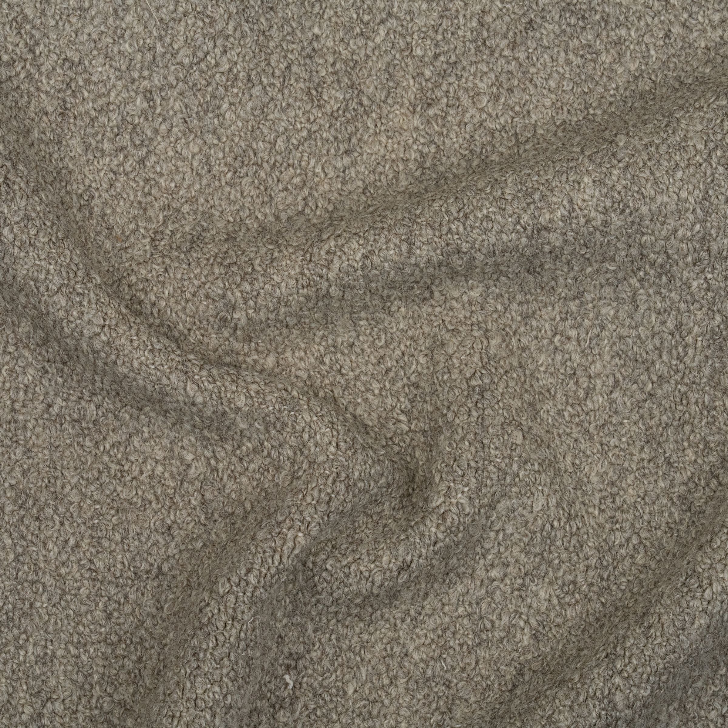 Textured gray color upholstery swatch with subtle folds