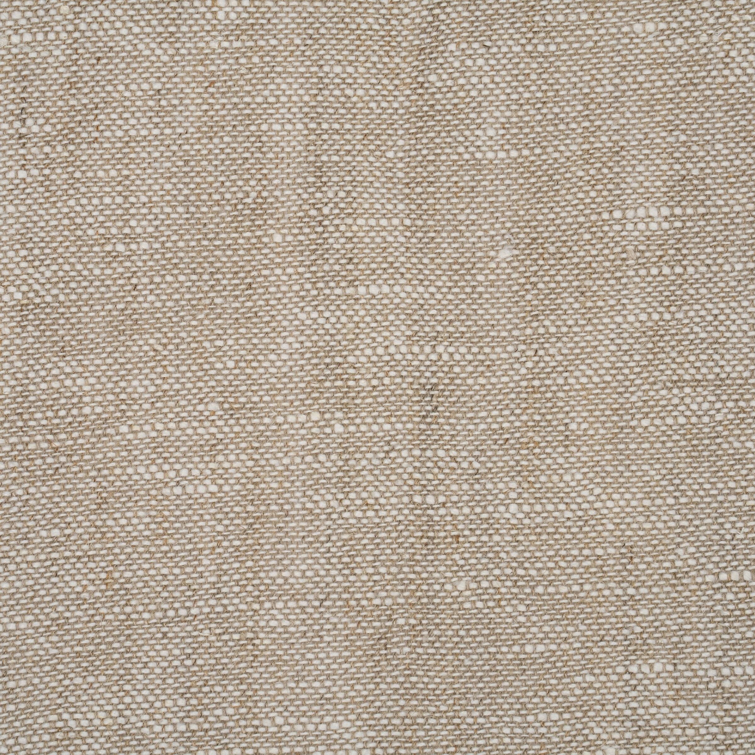 Close up of textured beige fabric pattern