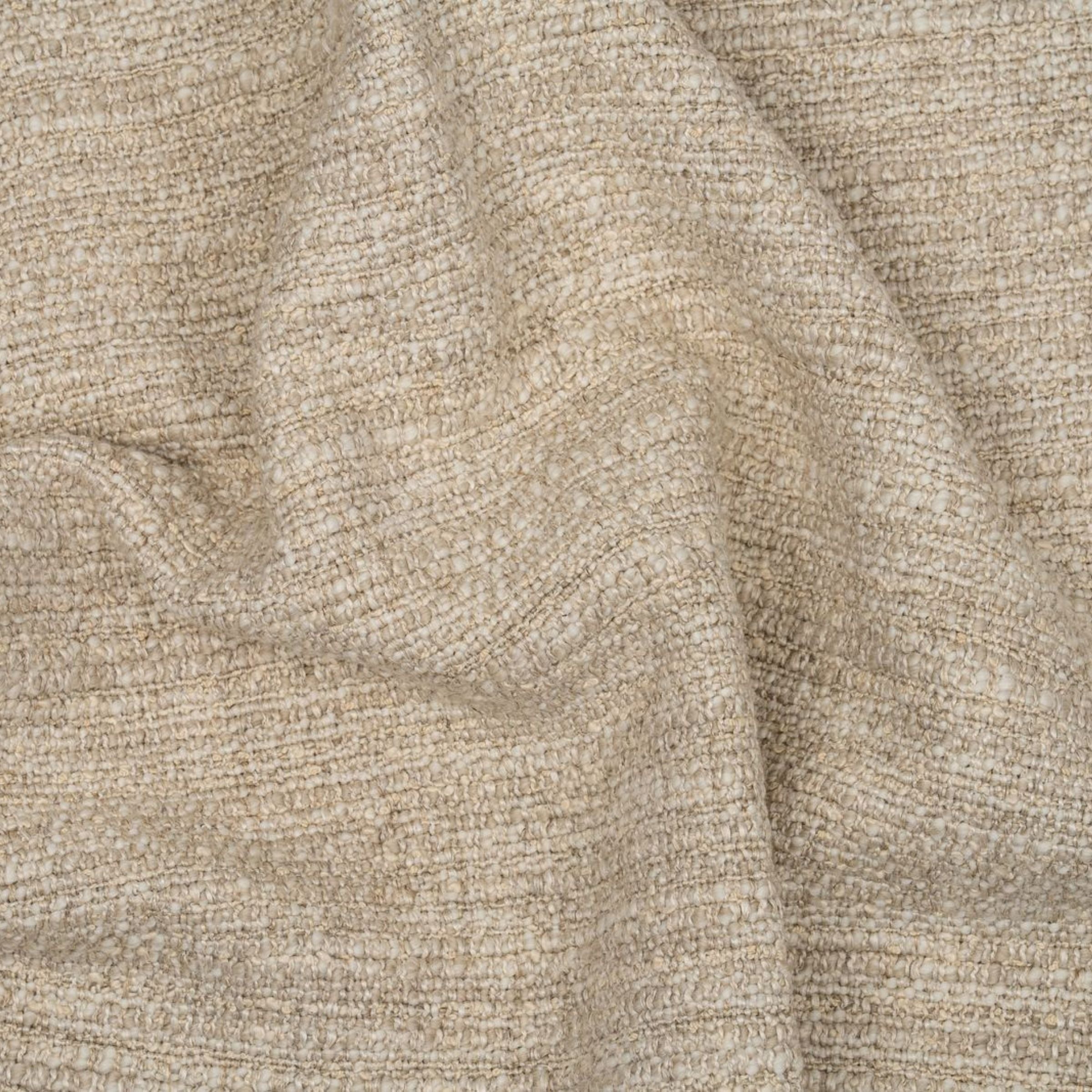 Beige textured upholstery pattern with subtle folds