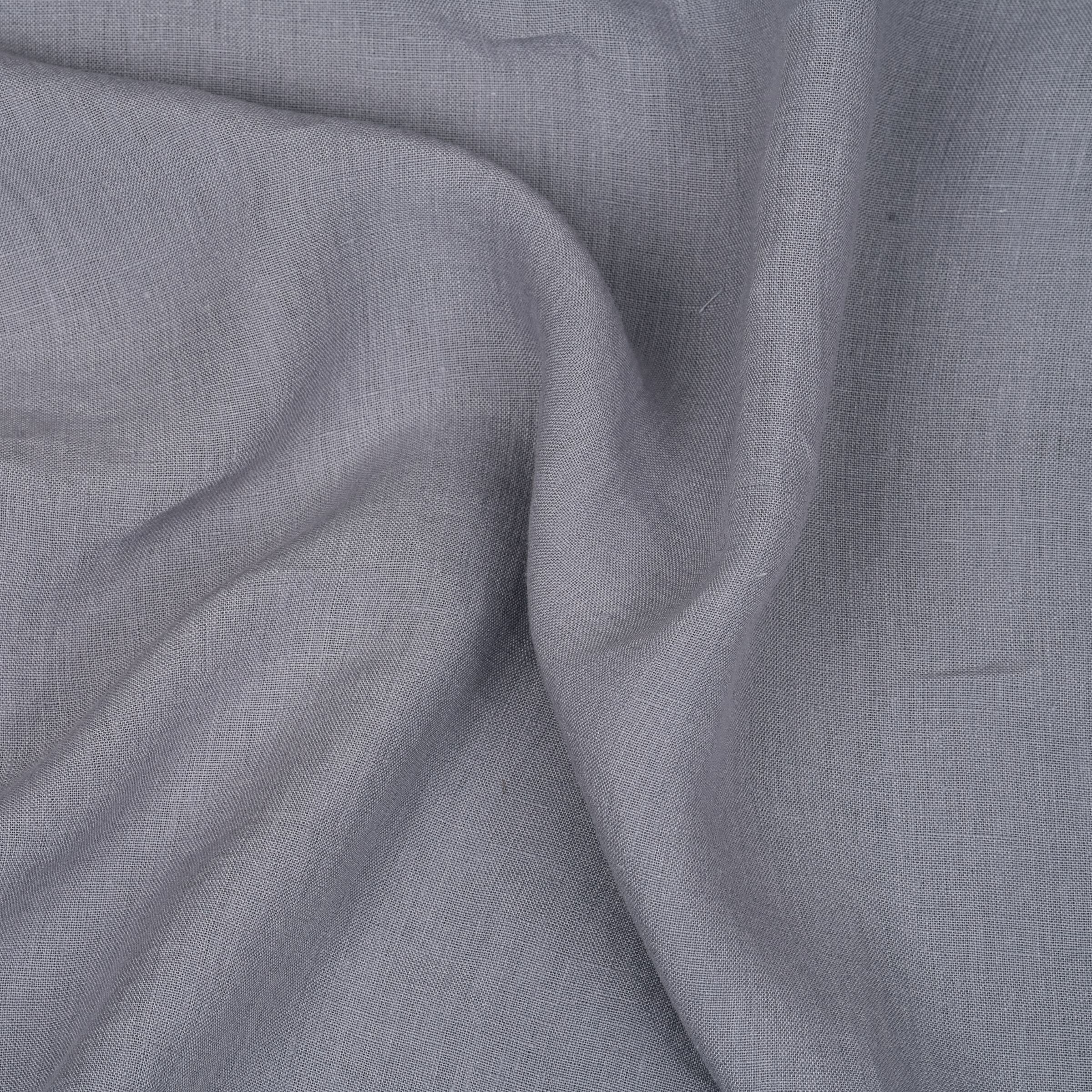 Close-up of purple gray fabric with folds