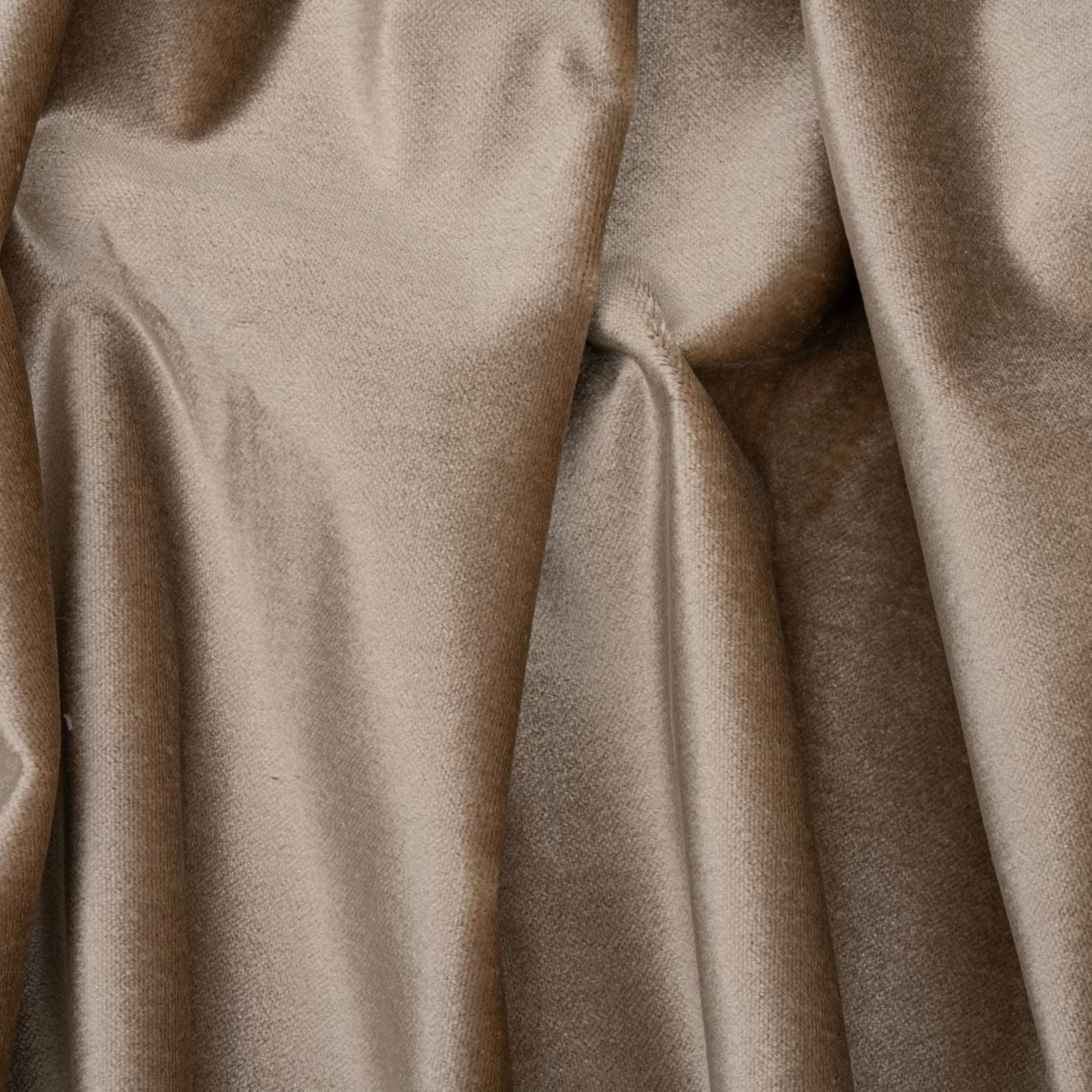 Close-up of beige fabric with folds