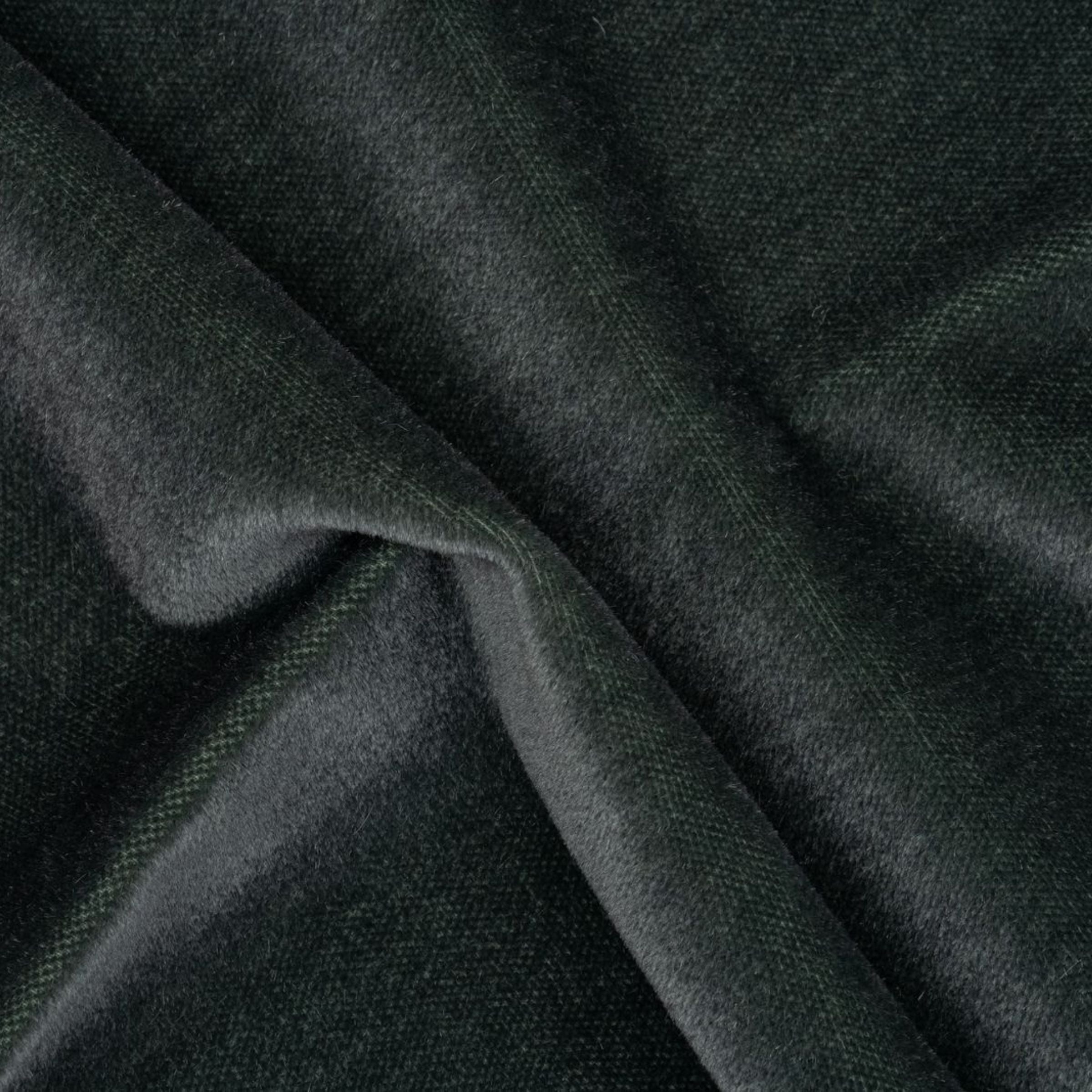 Dark green fabric with a subtle texture