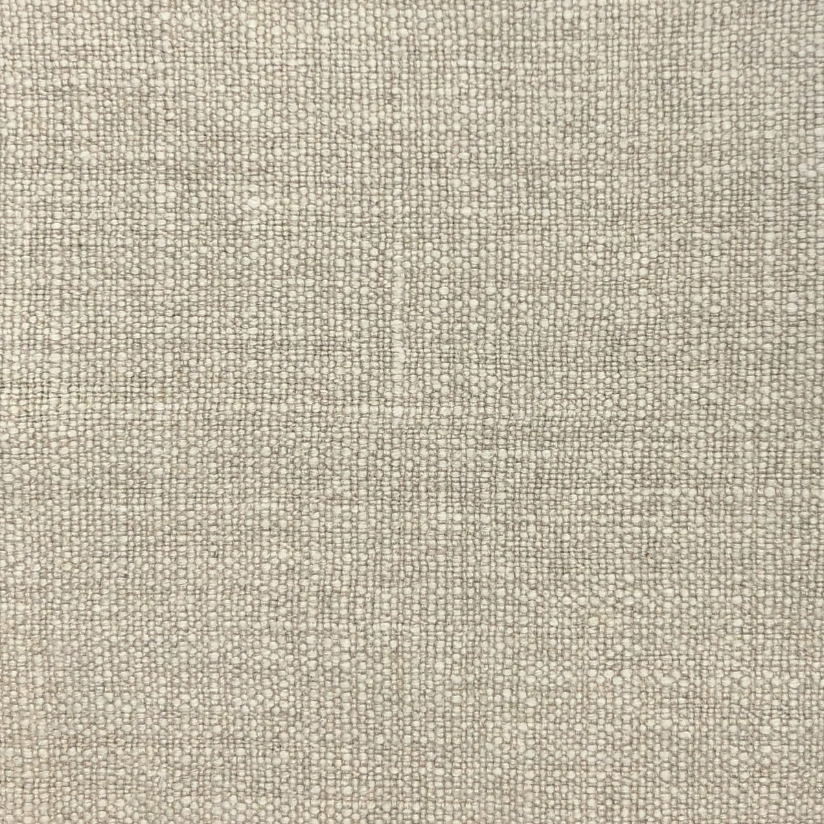 Elegantly textured linen fabric with bold threads creating a light cofee monochromatic slub textured textile.