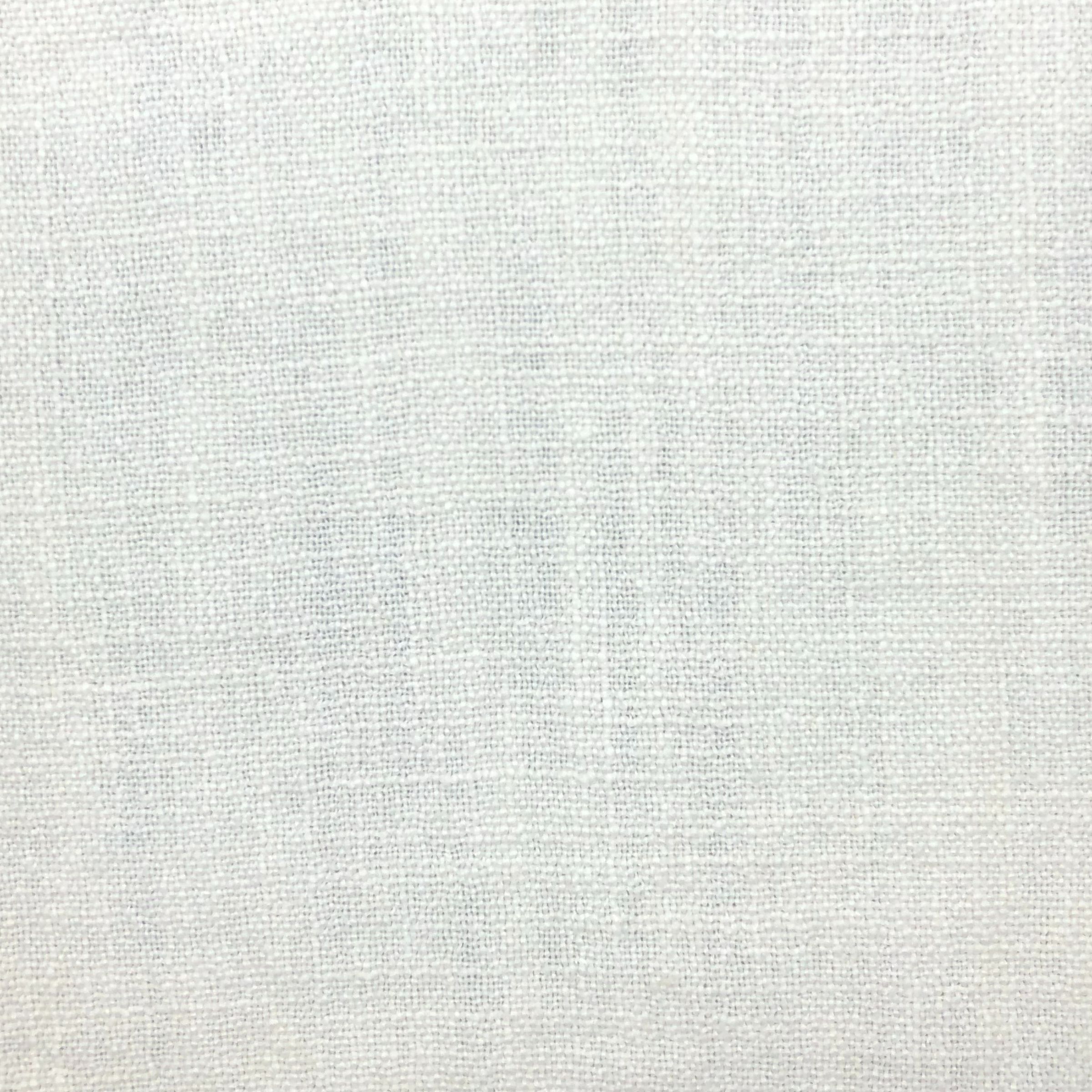 Linen fabric with bold colored threads creating a white monochromatic slub textured textile.