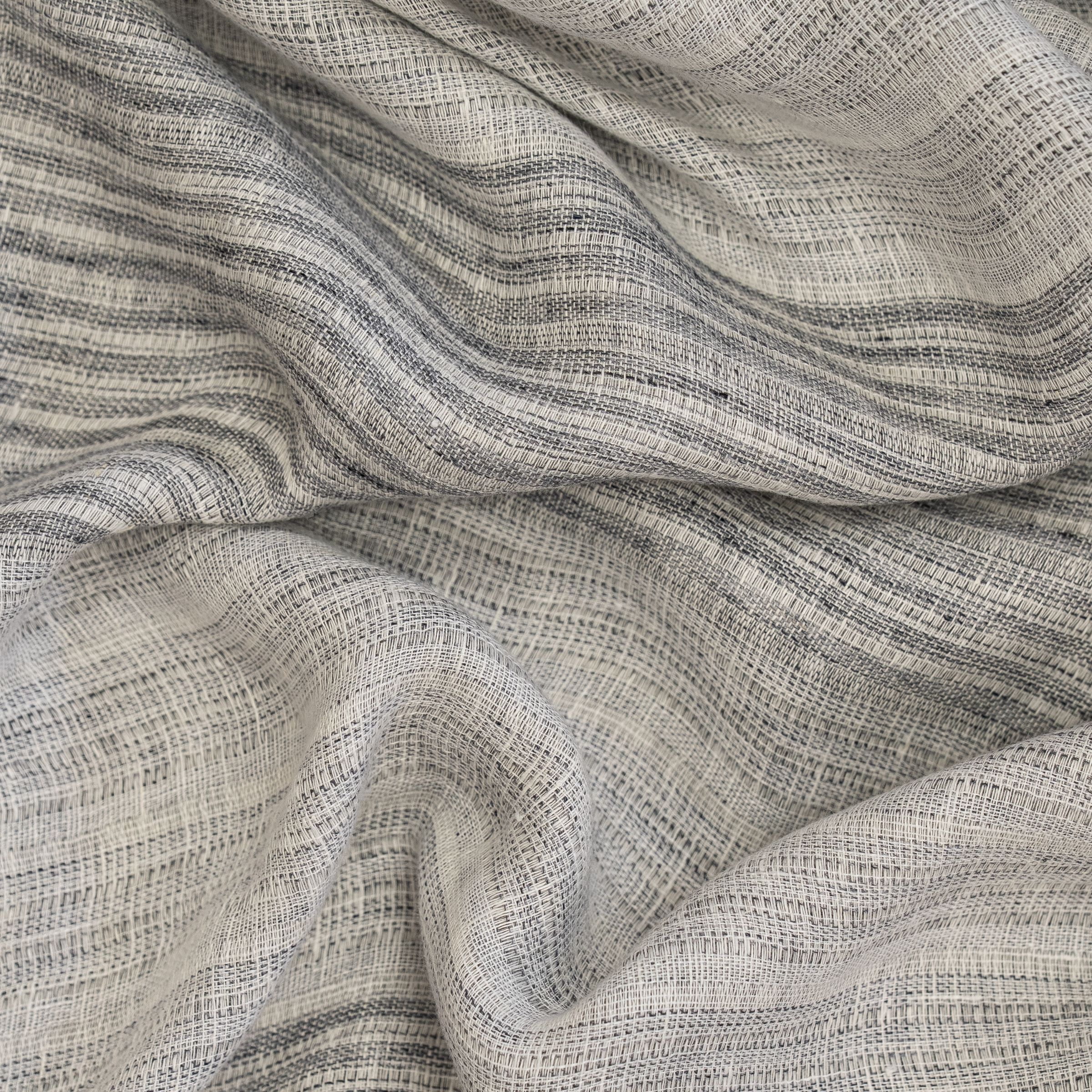 Textured striped, gray fabric with subtle wavy folds