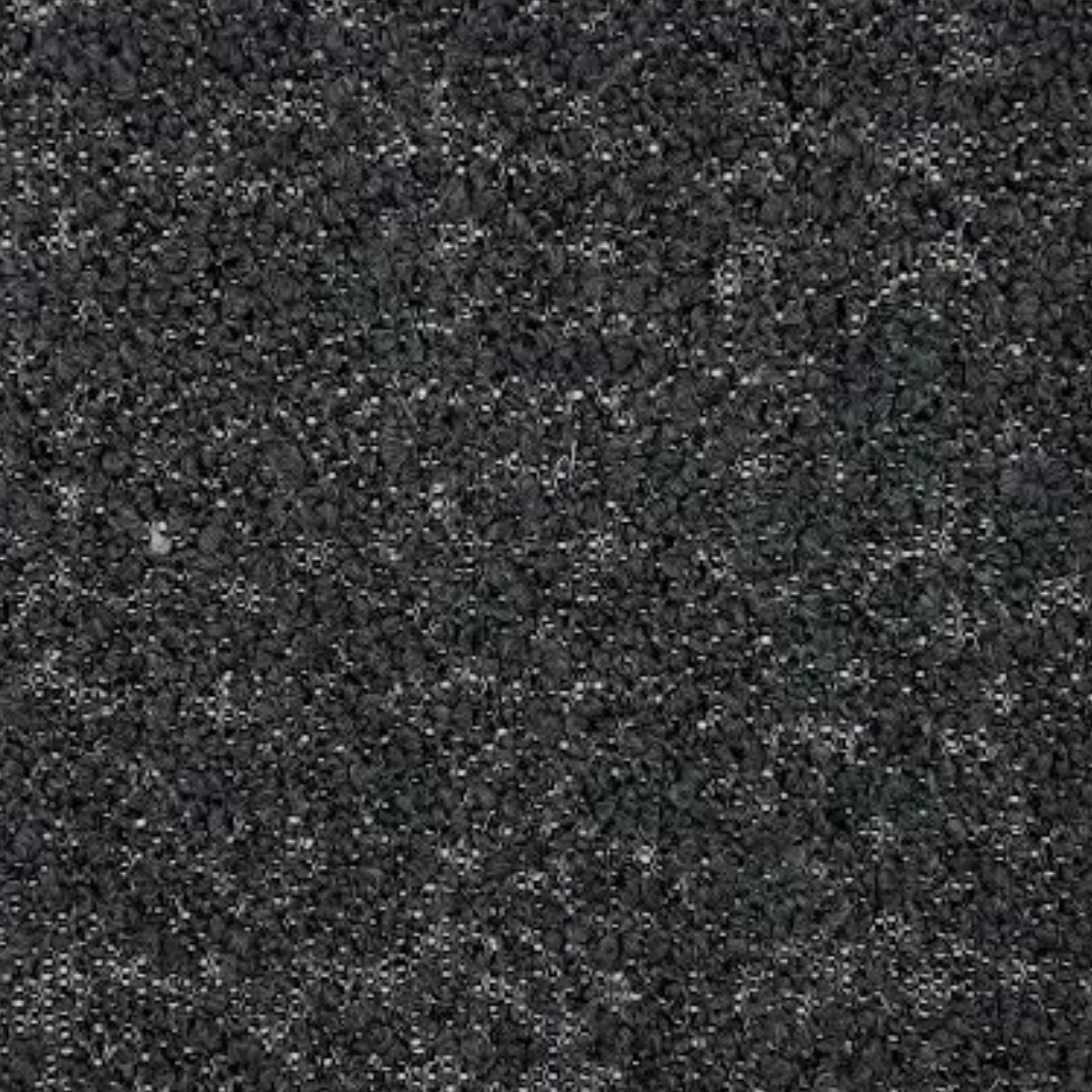 Fuzzy dark charcoal grey boucle textured upholstery fabric.