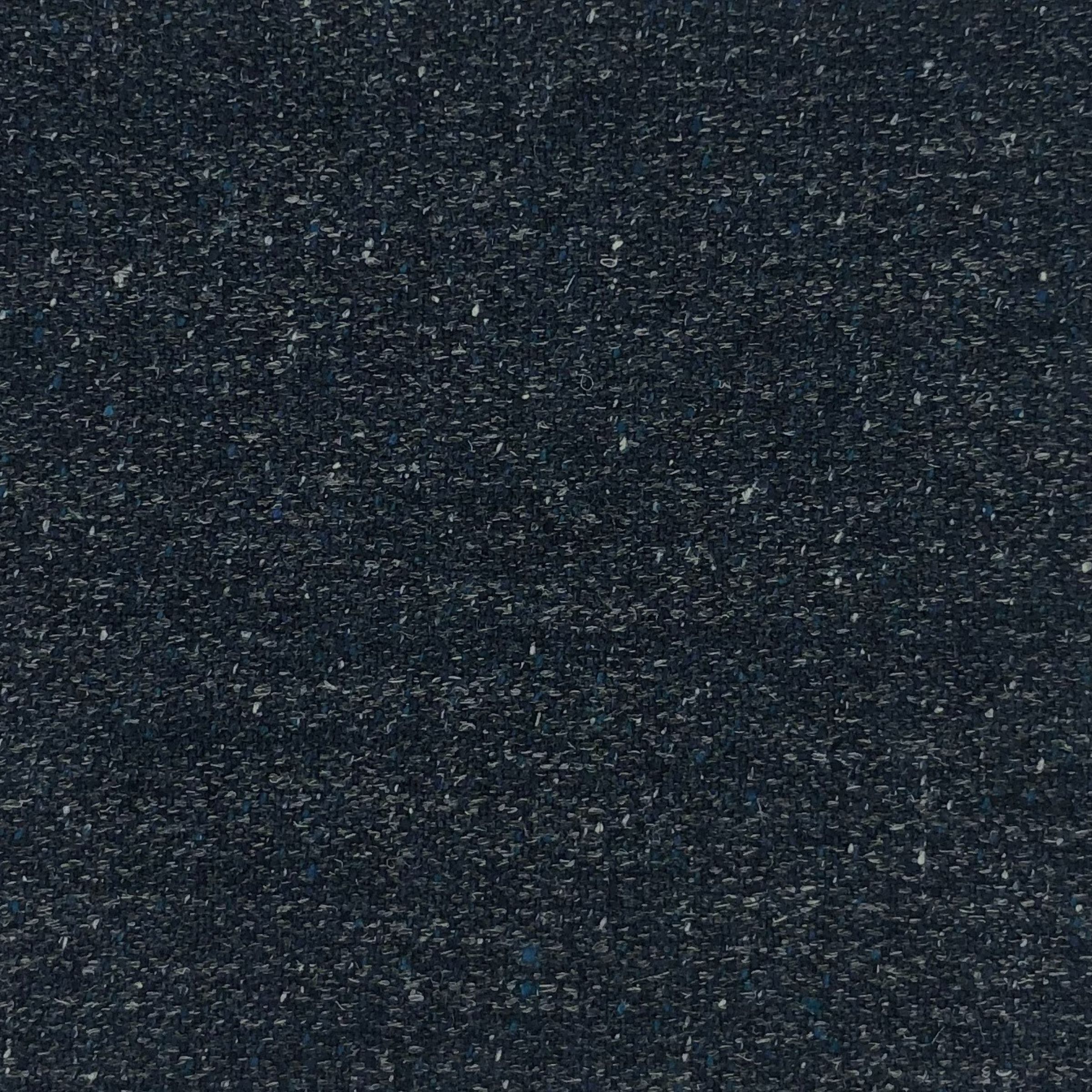 Night is dark colored textured weave with a subtle sheen, suitable for upholstery.