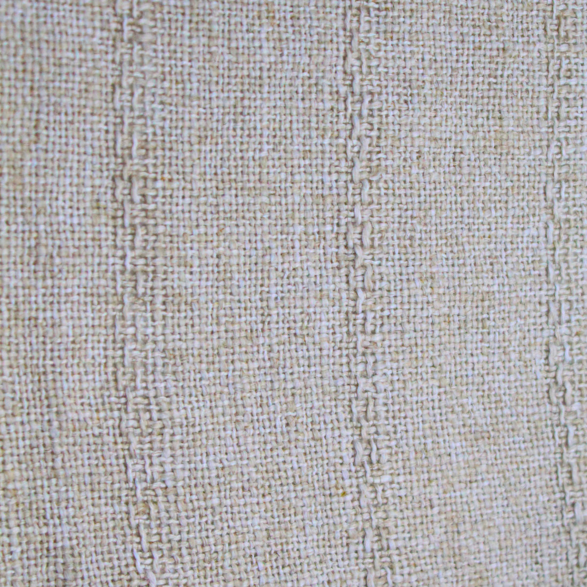 A Linen polyester blend of beige vintage color fabric, featuring a loose weave with a sublte vertical pattern in the same color as the weave. 