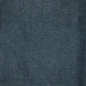 Solid blueish-green colored window covering fabric, featuring a heavy durable linen blend weave.