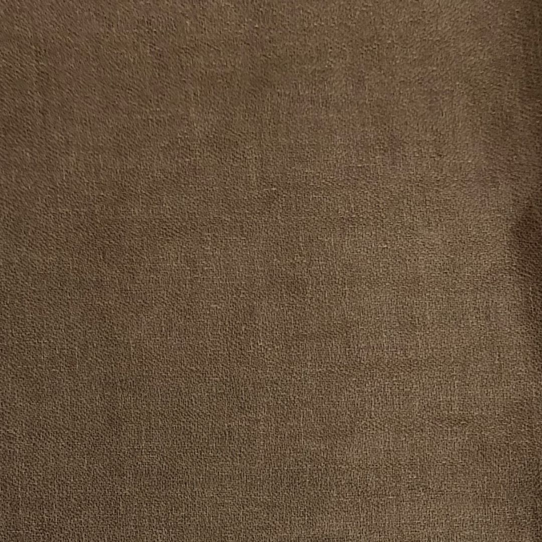 A sheer nut colored linen fabric with a subte natural sheen.