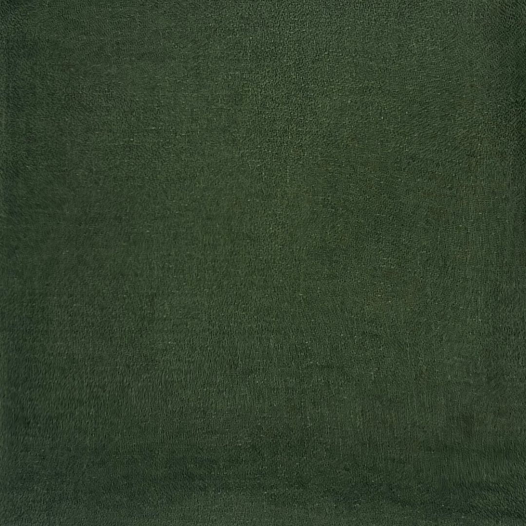 Deep forest green almost etheral fabric with substantial sheen.