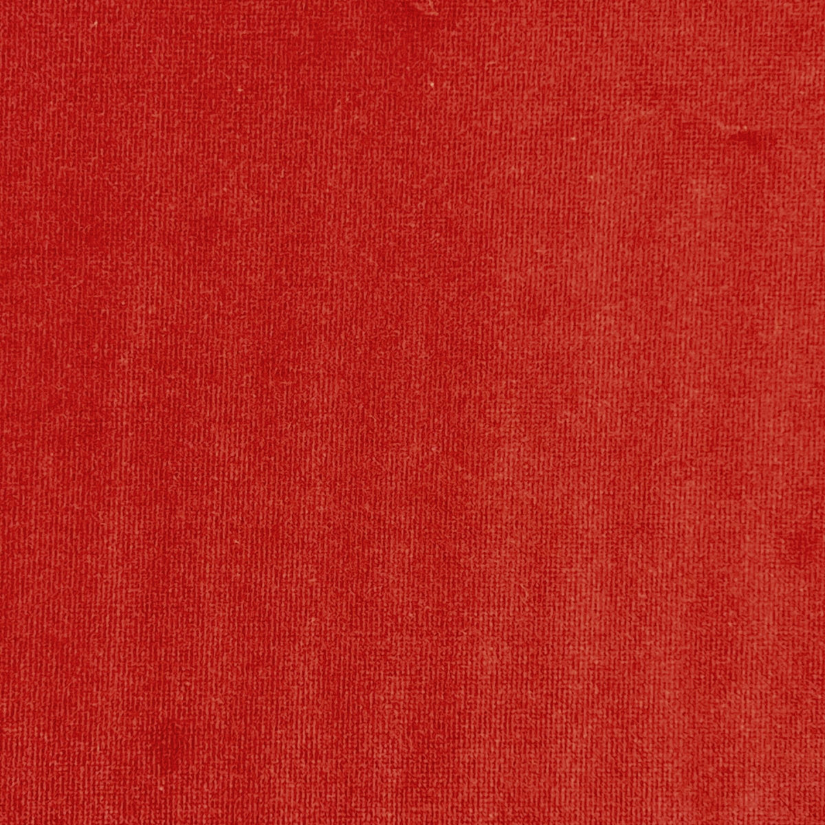 Keira is a vibrant red velvet fabric with dense pile and luxurious sheen.