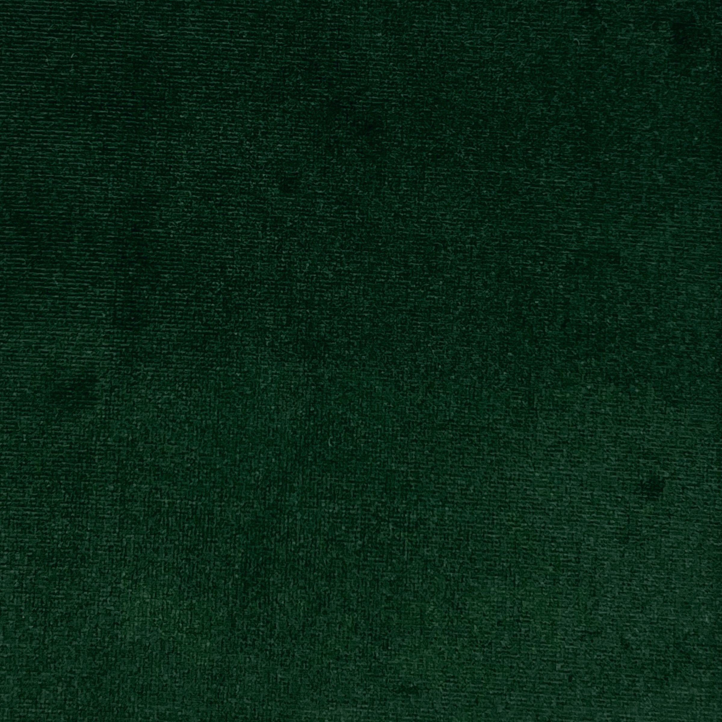 Keira is a vibrant dark green velvet fabric with dense pile and luxurious sheen.