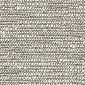 Lecce a textured upholstery in beige with a pronounced looped weave, giving it a chuncky appearance. 
