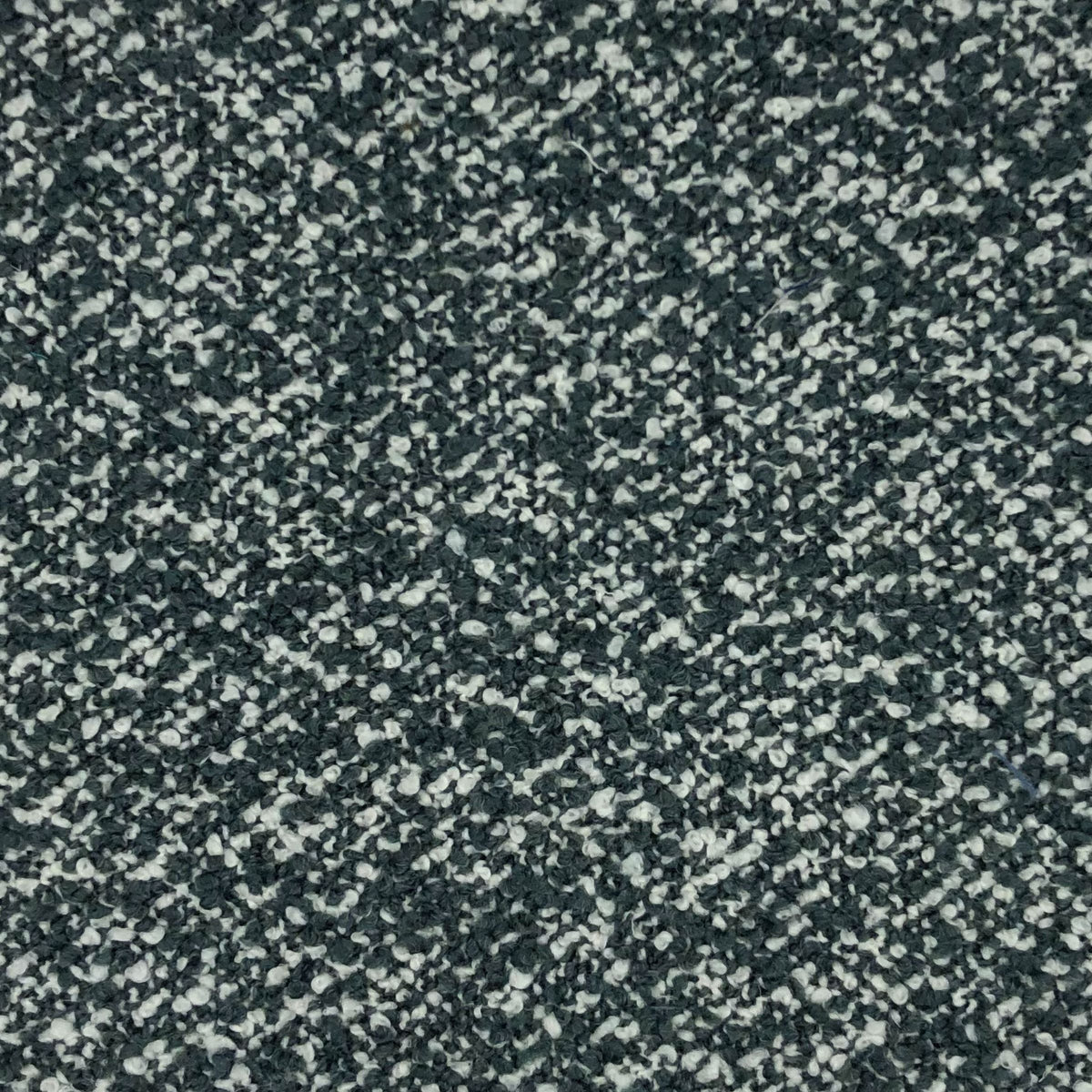 Maira - Mist is a highly textured, pebbled surface creating a contrast of soft fuzzy misty blue and white fibers. 