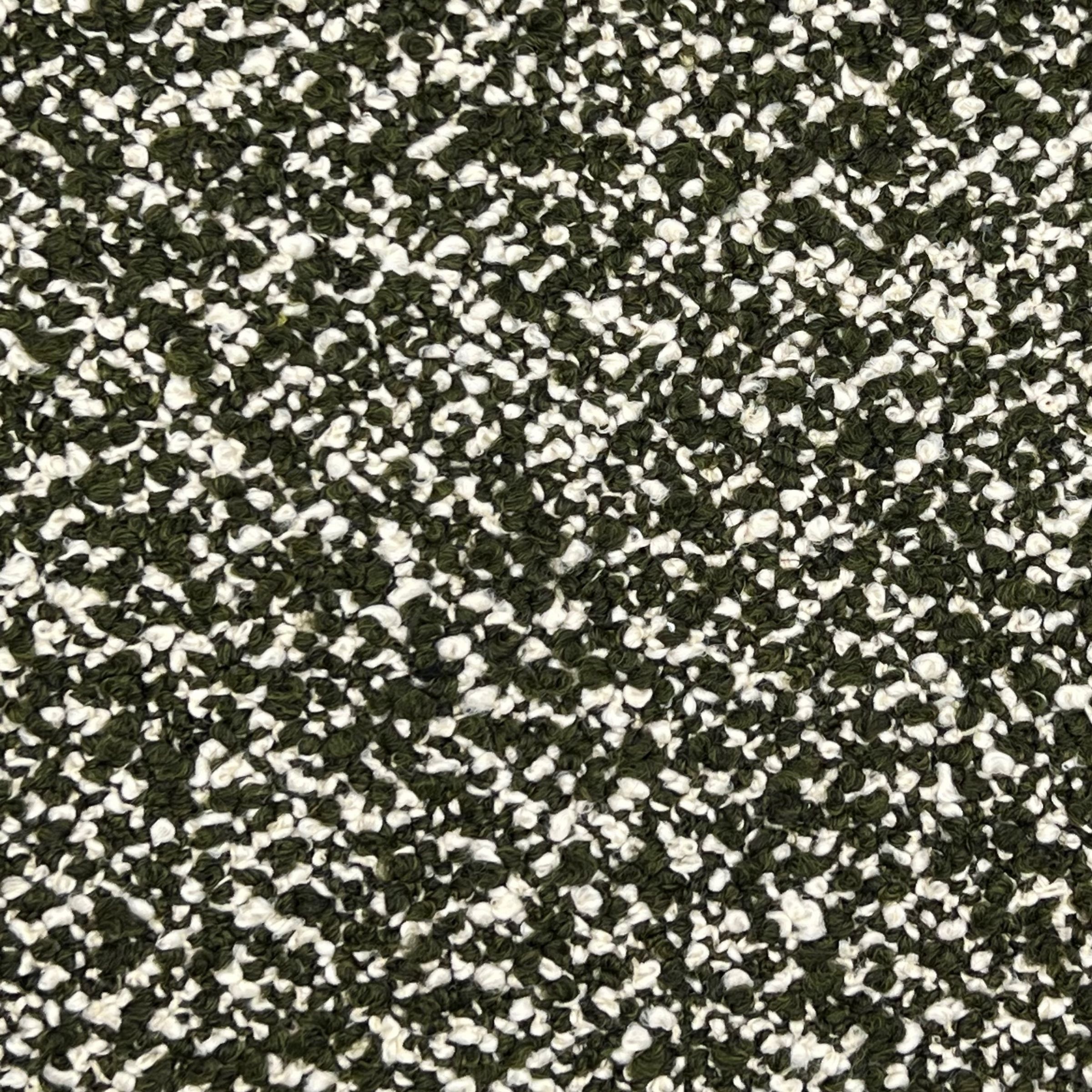 Maira - Olive is a highly textured, pebbled surface creating a contrast of soft fuzzy green and white fibers. 